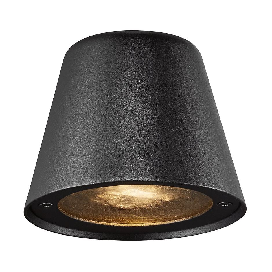 A black outdoor wall-mounted light with a directional beam, installed on a grey textured wall.