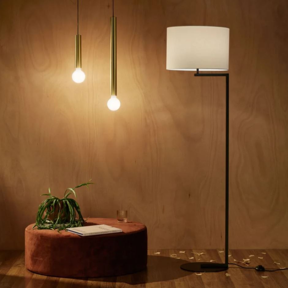 Modern floor lamp and pendant lights in a warm setting