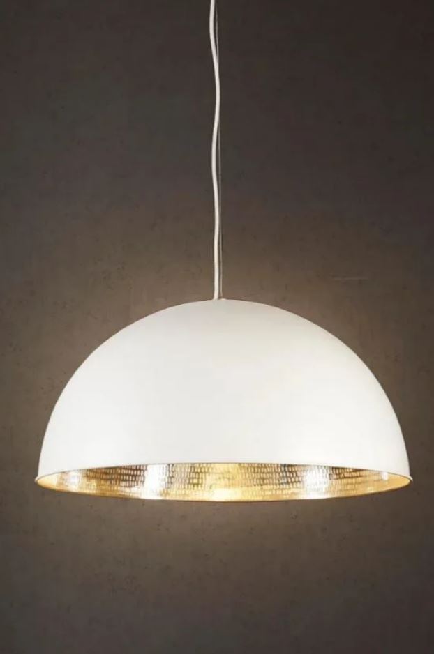 White pendant lamp with gold interior on a dark background