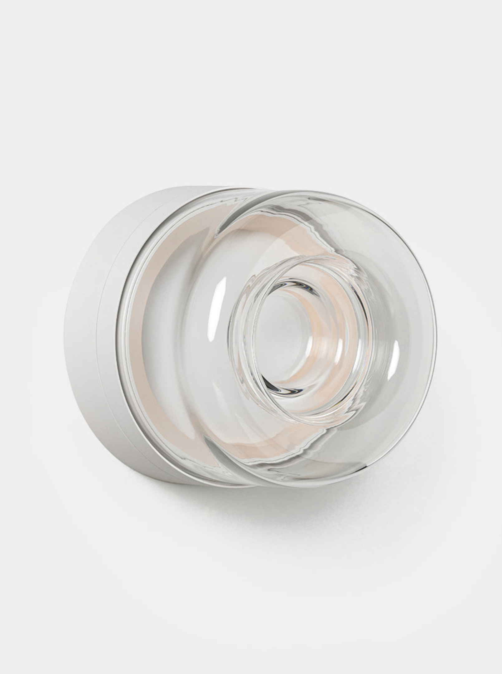 Clear glass and white wall light on a white background