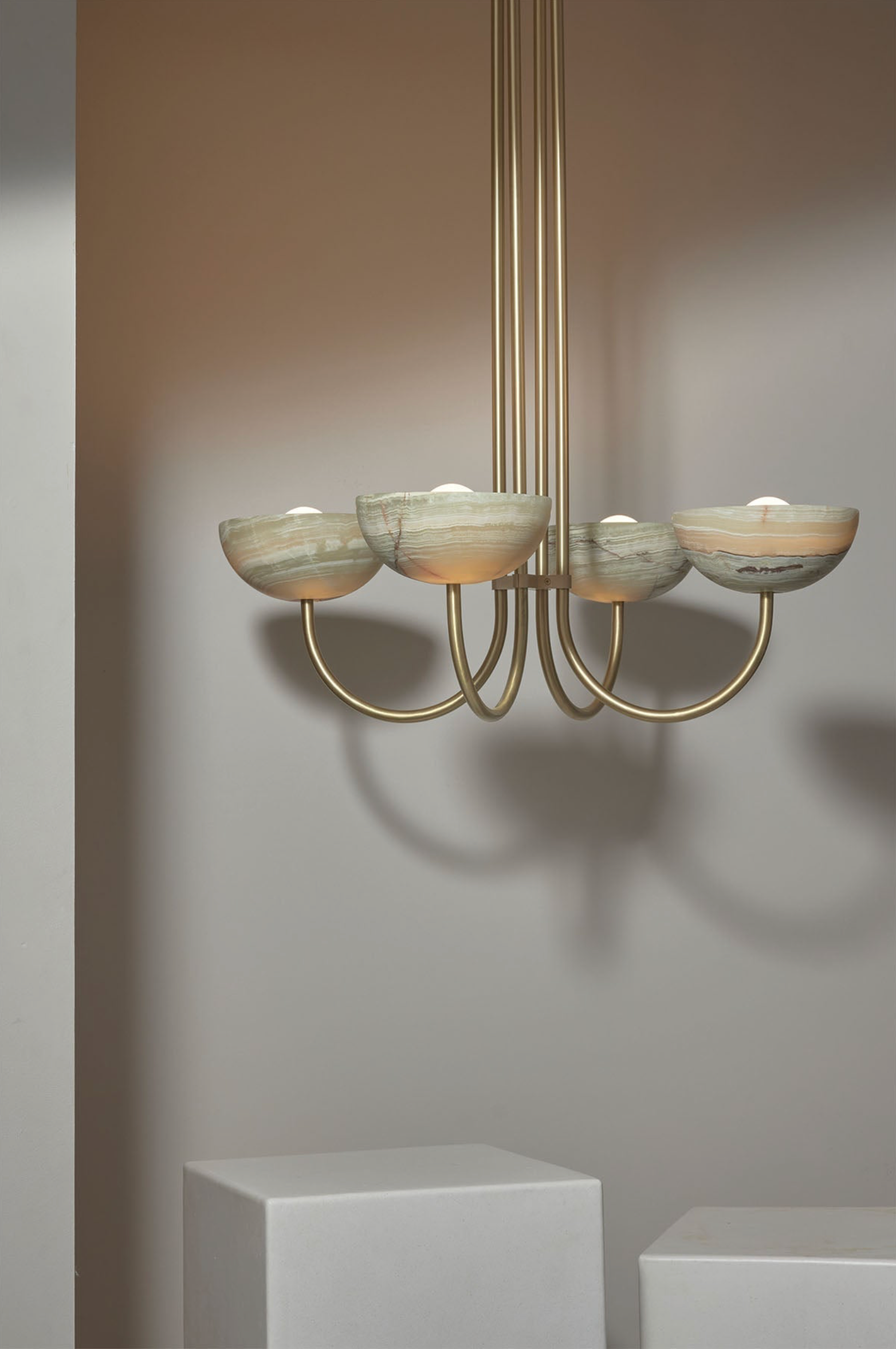 Chandelier with glass shades on a neutral background