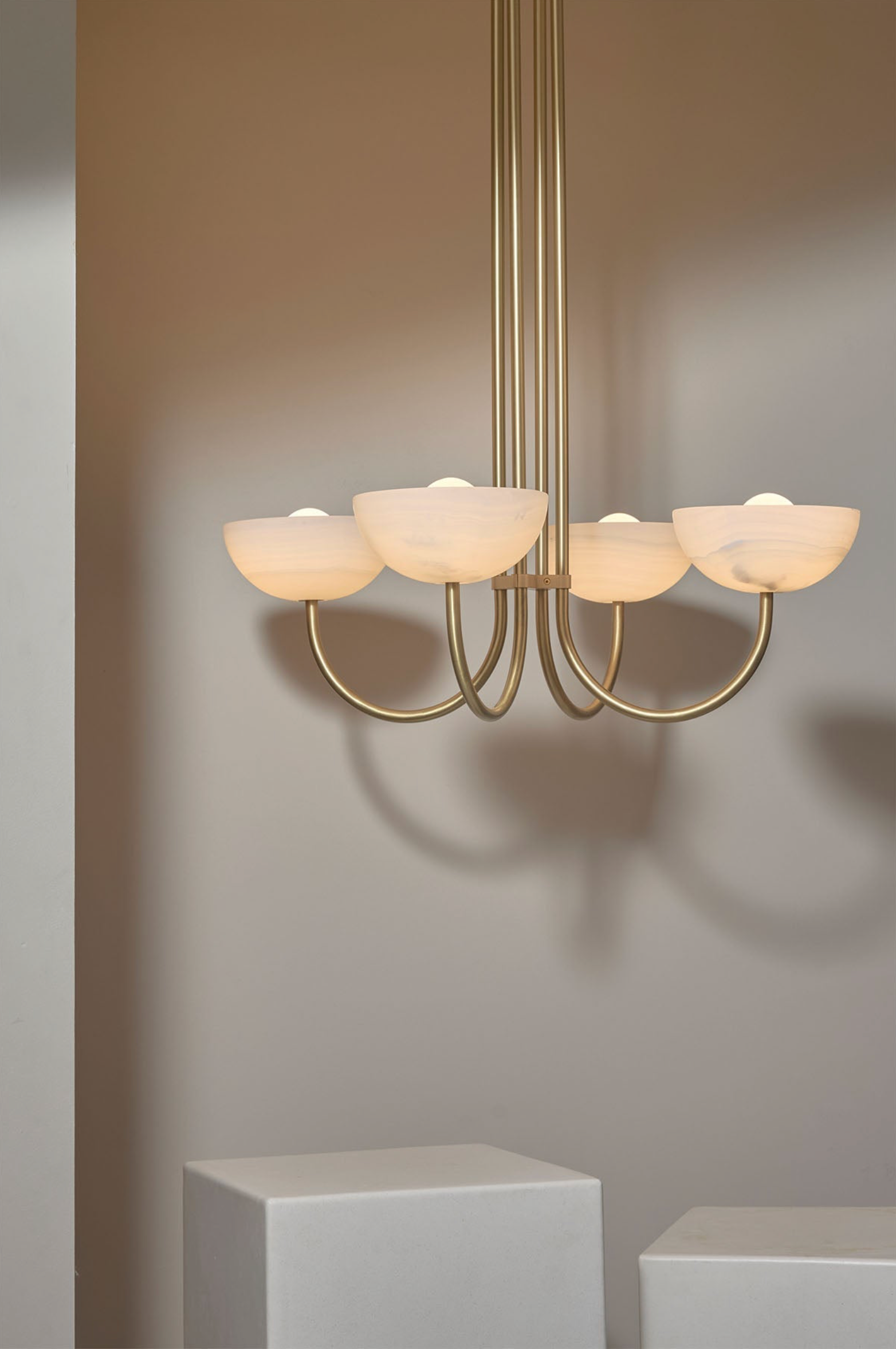 Chandelier with glass shades on a neutral background