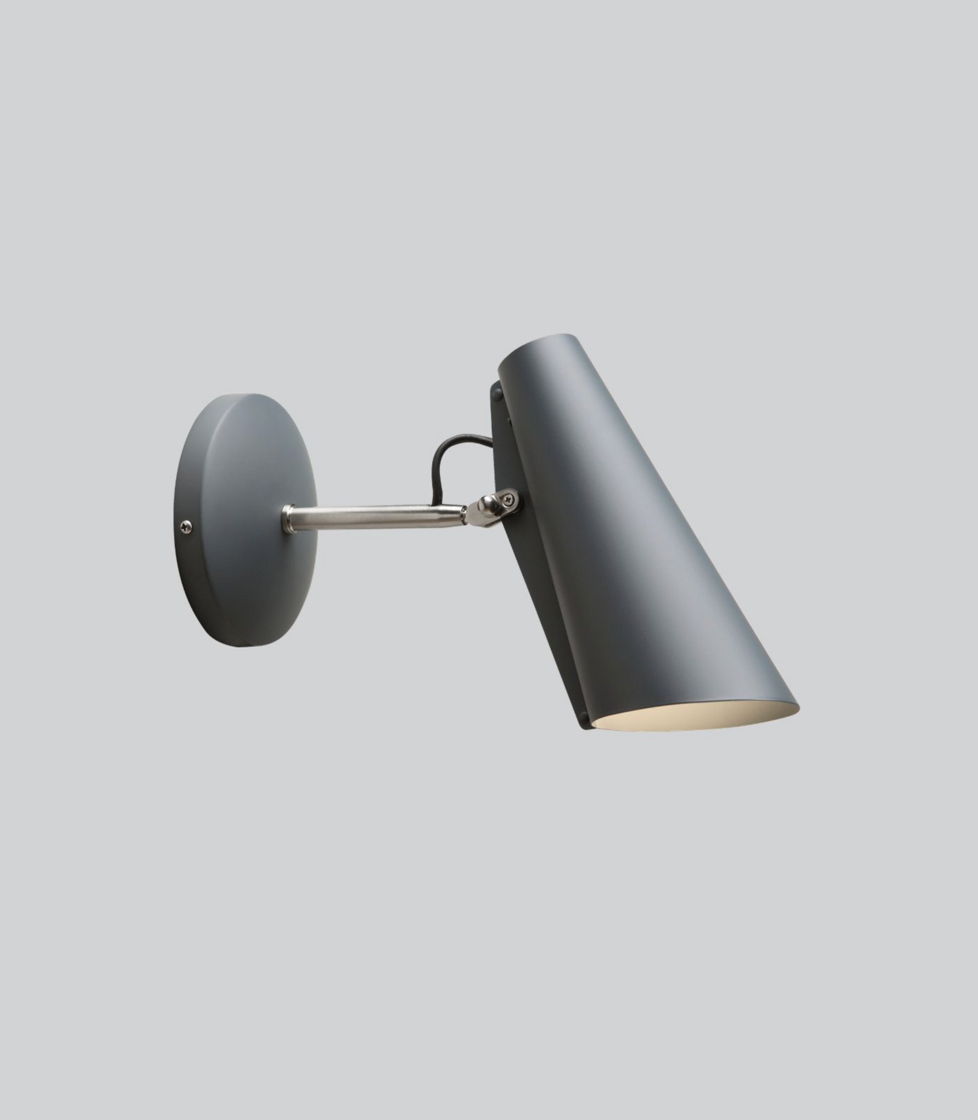 Wall-mounted lamp with a grey finish on a light gray background