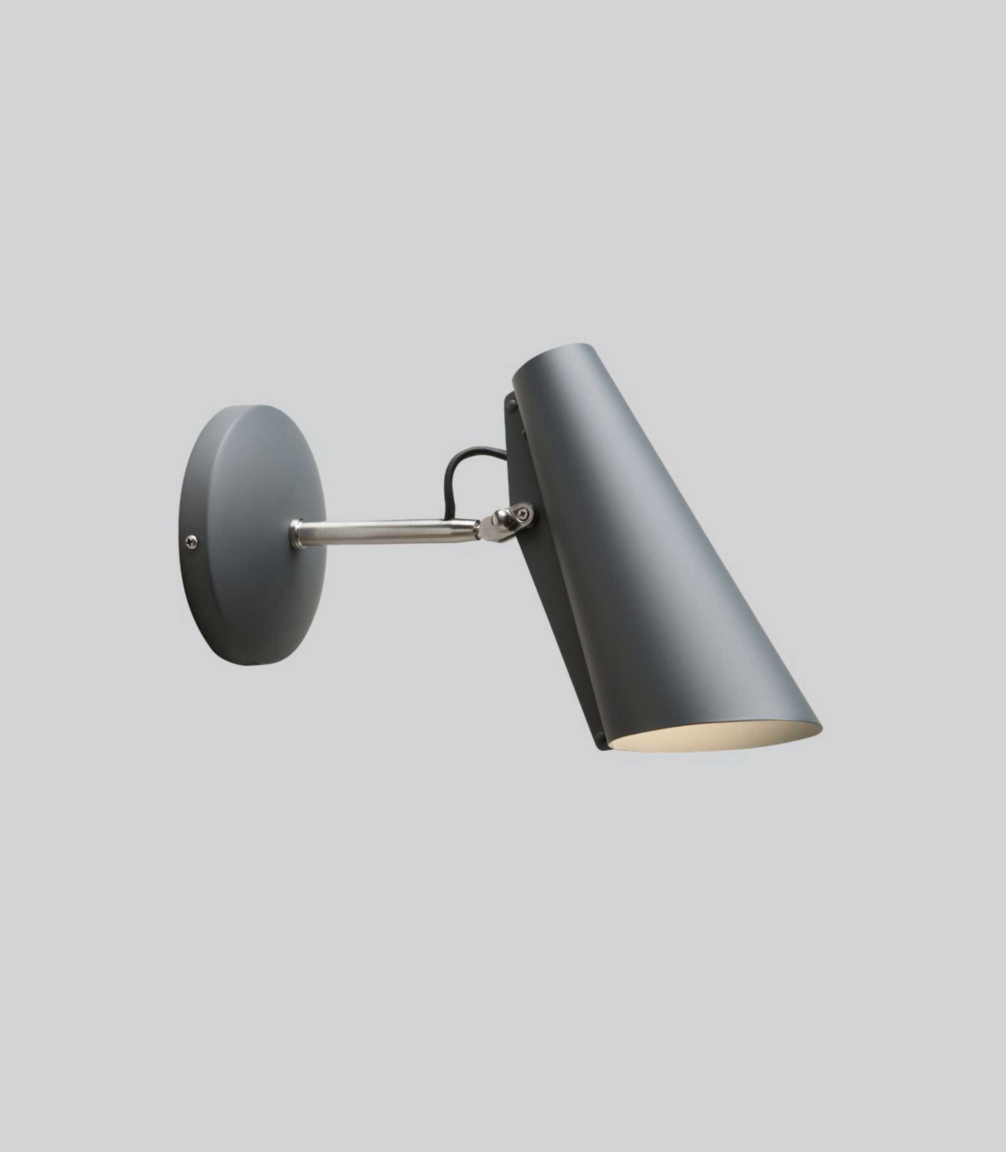 Wall-mounted lamp with a grey finish on a light gray background