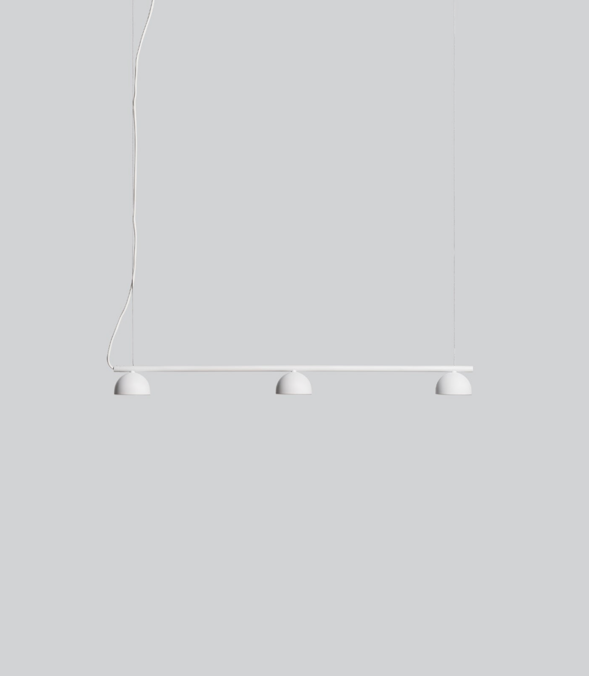 Modern white pendant light with three white lampshades on a grey background