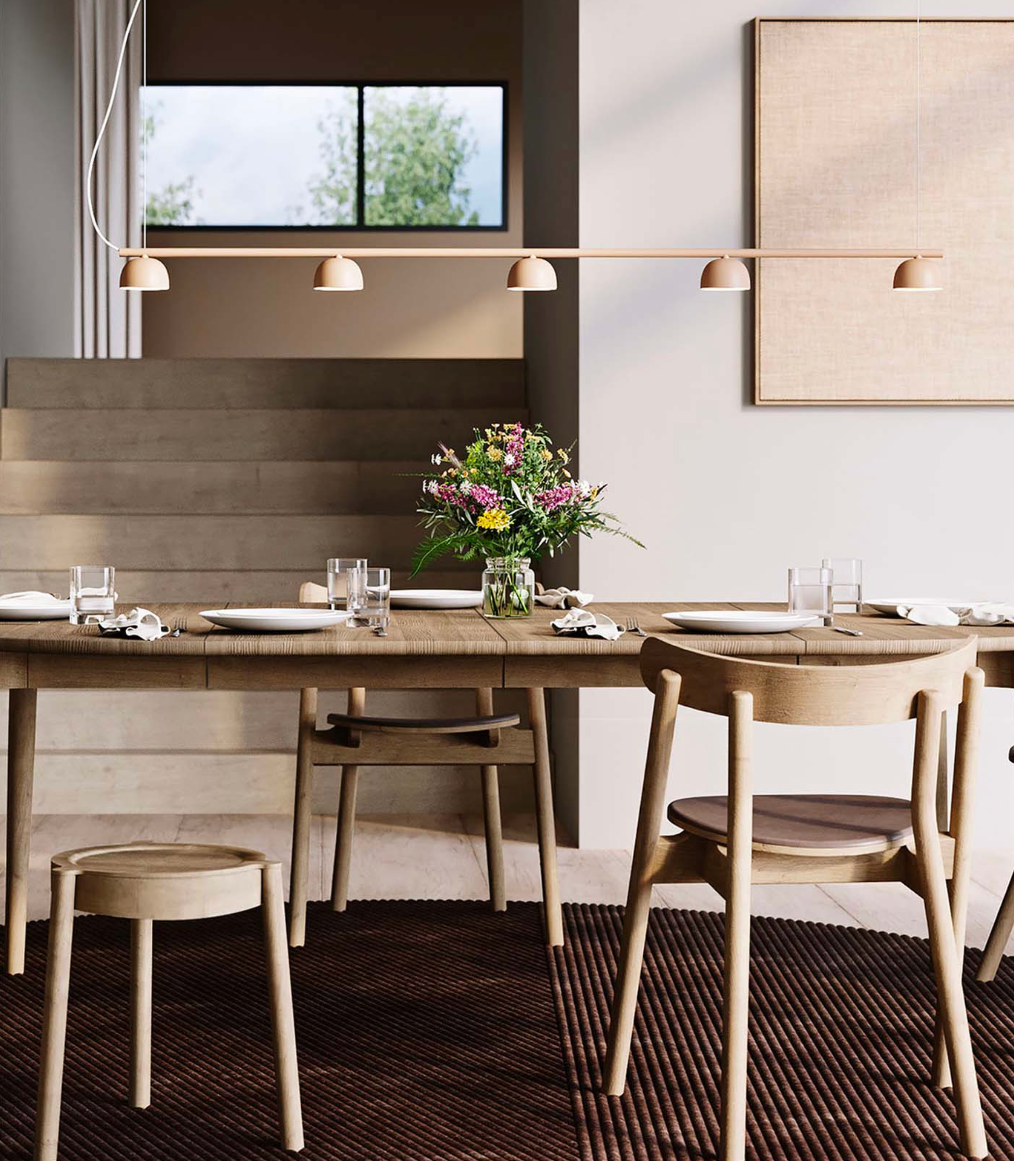 Dining room with wooden table and chairs, flowers in the center.