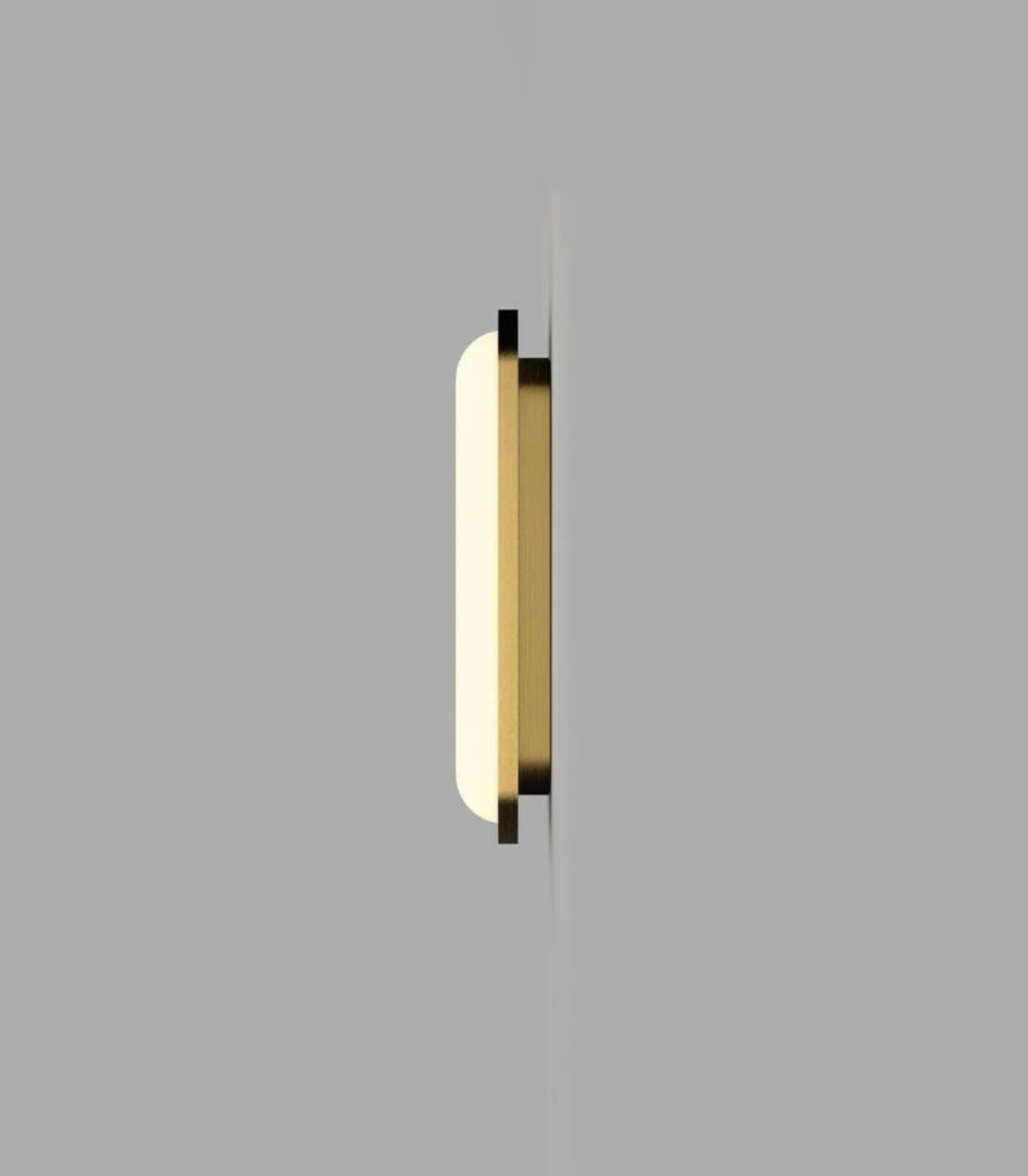 Gold rectangular light fixture on a grey background