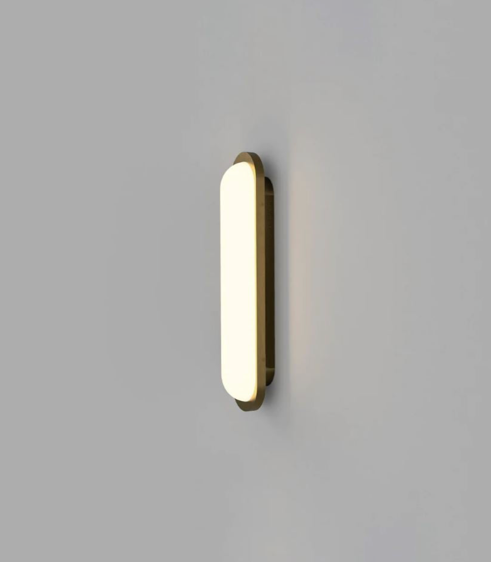 Modern wall-mounted light fixture on a grey background