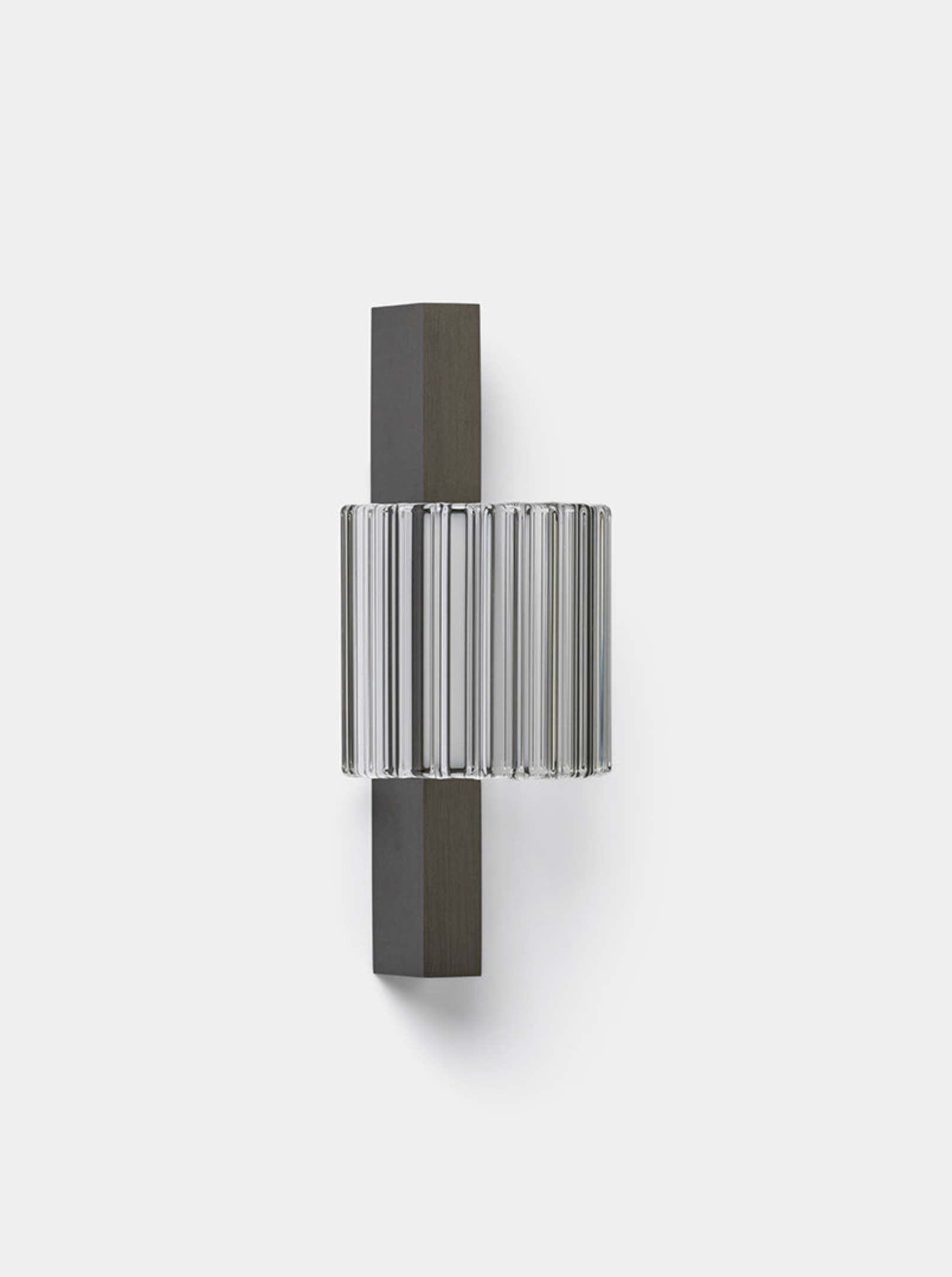 Wall-mounted light fixture with cylindrical design on a white background