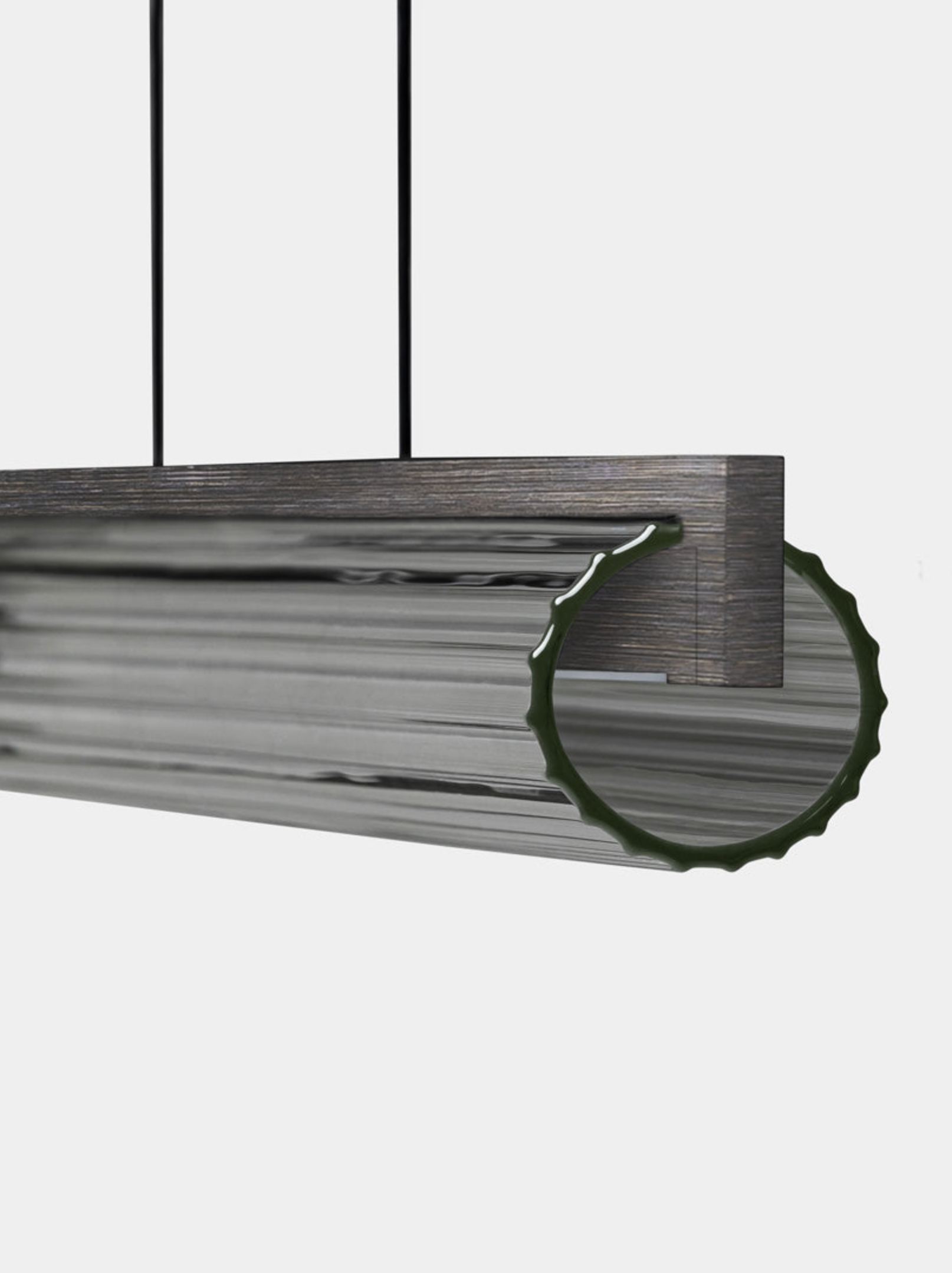 Metallic linear ceiling light fixture on a white background