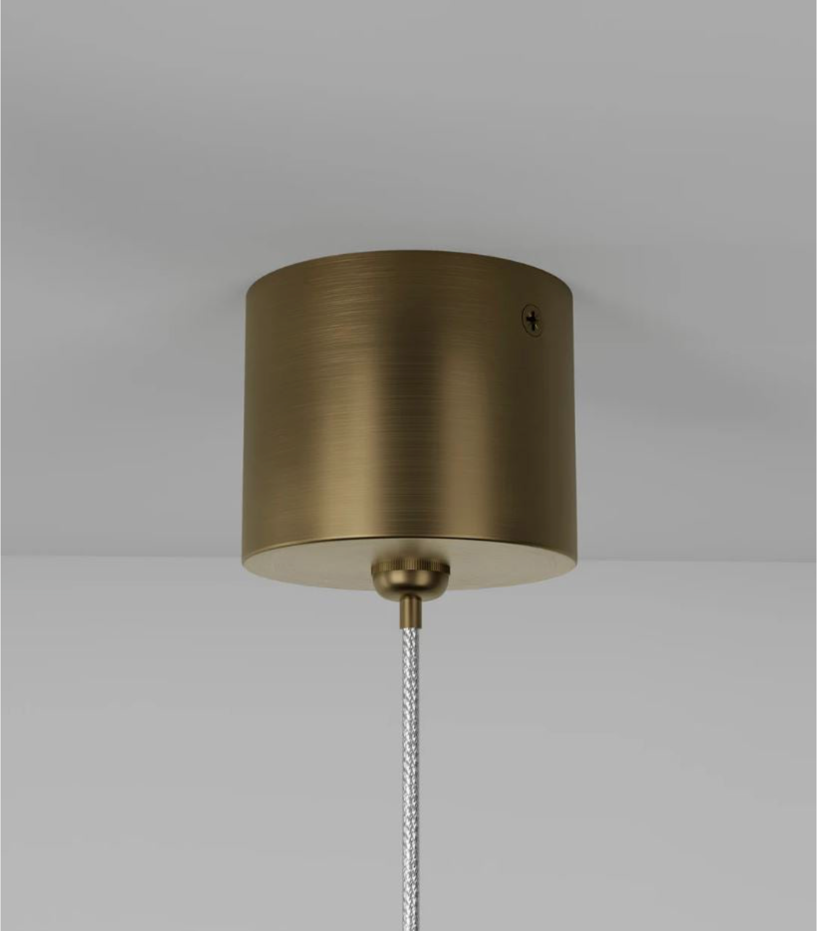 Bronze pendant light fixture on a grey background