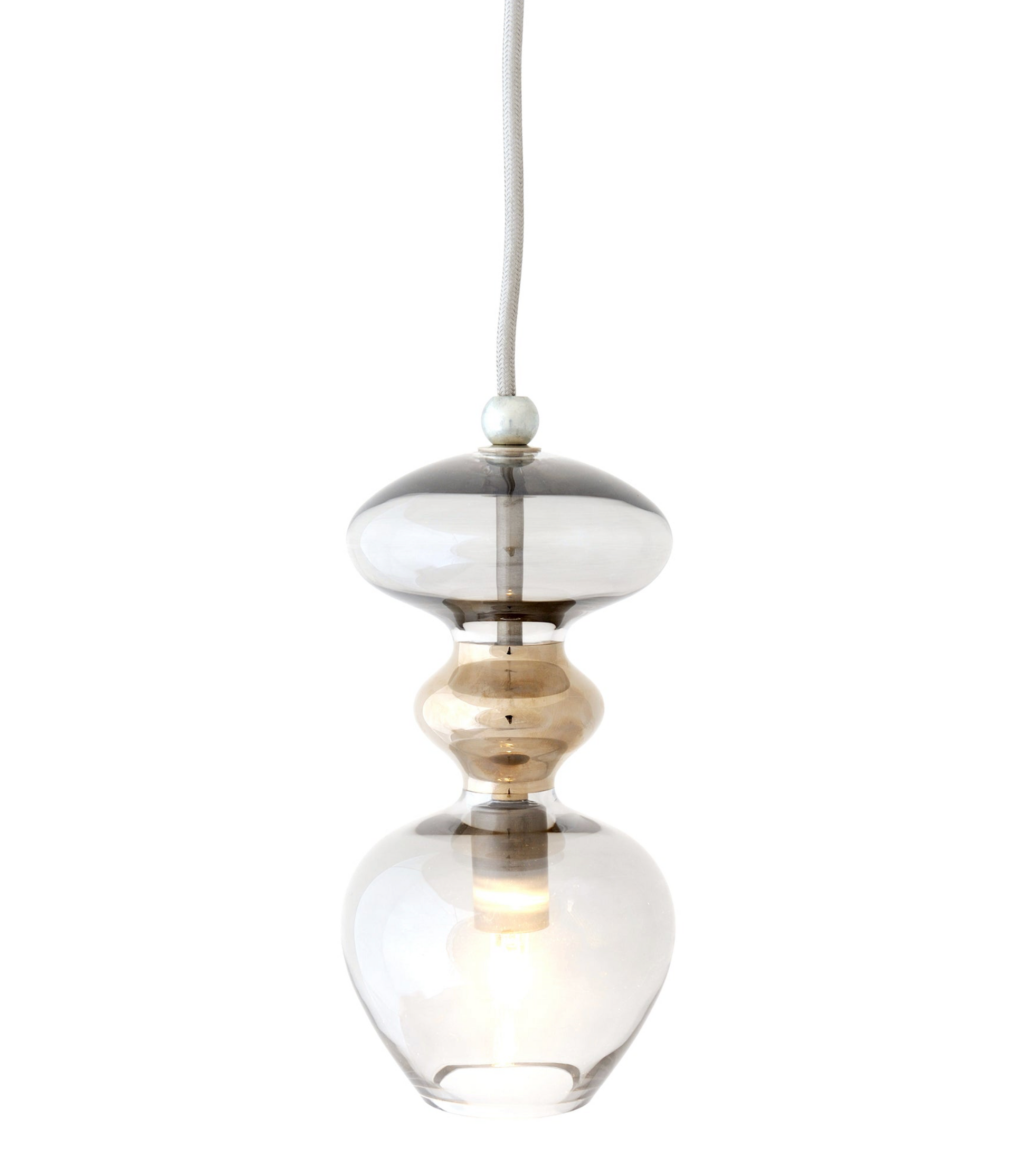 Modern pendant light with glass shade on a white background