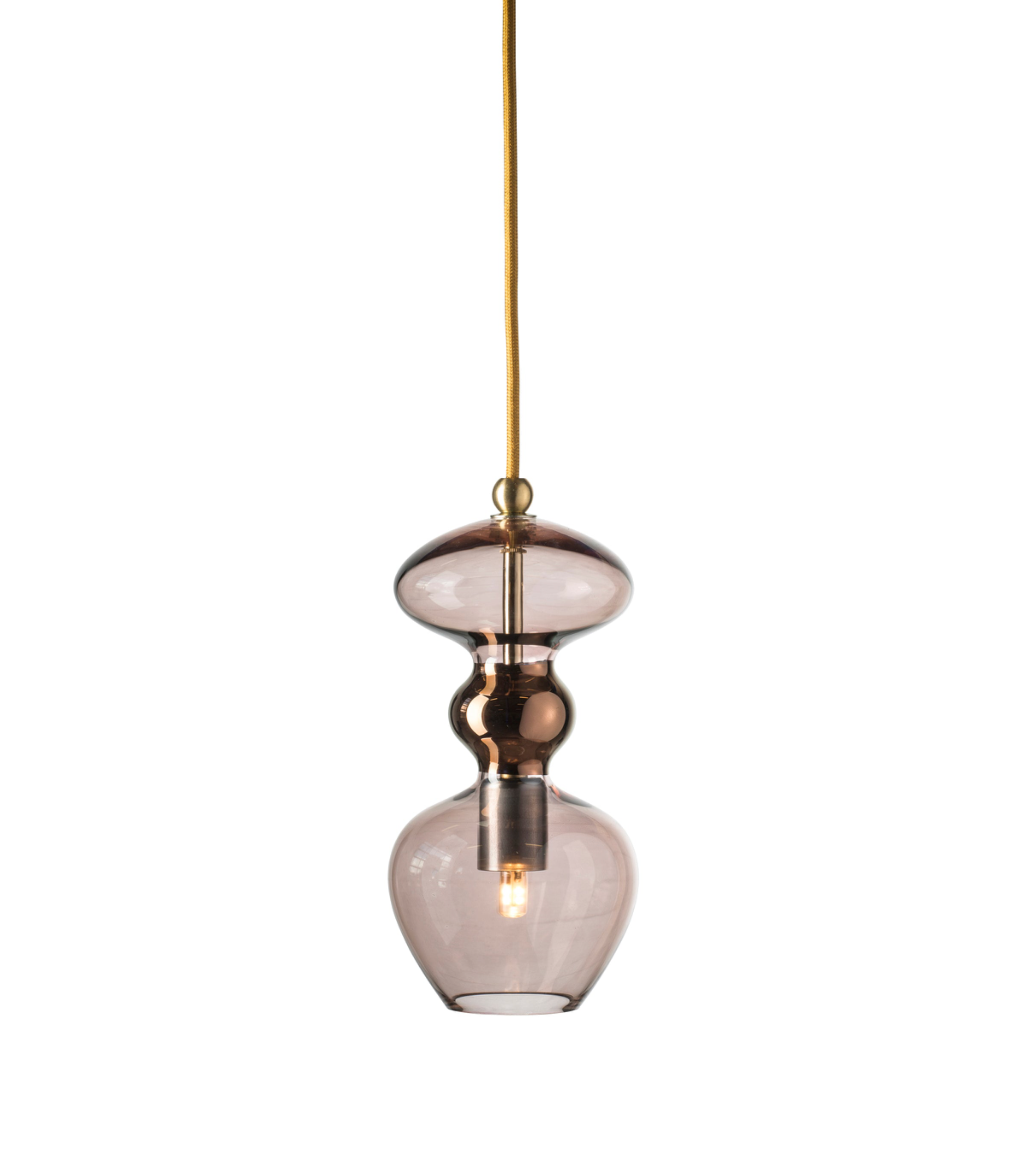 Pendant light with glass shade and brass fixture on a white background