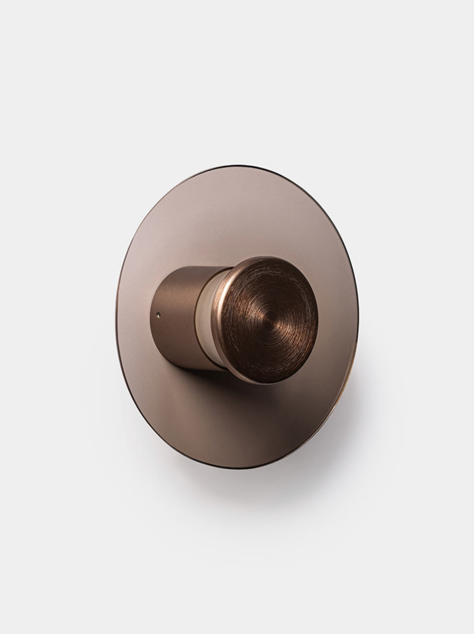 Bronze wall light on a white background
