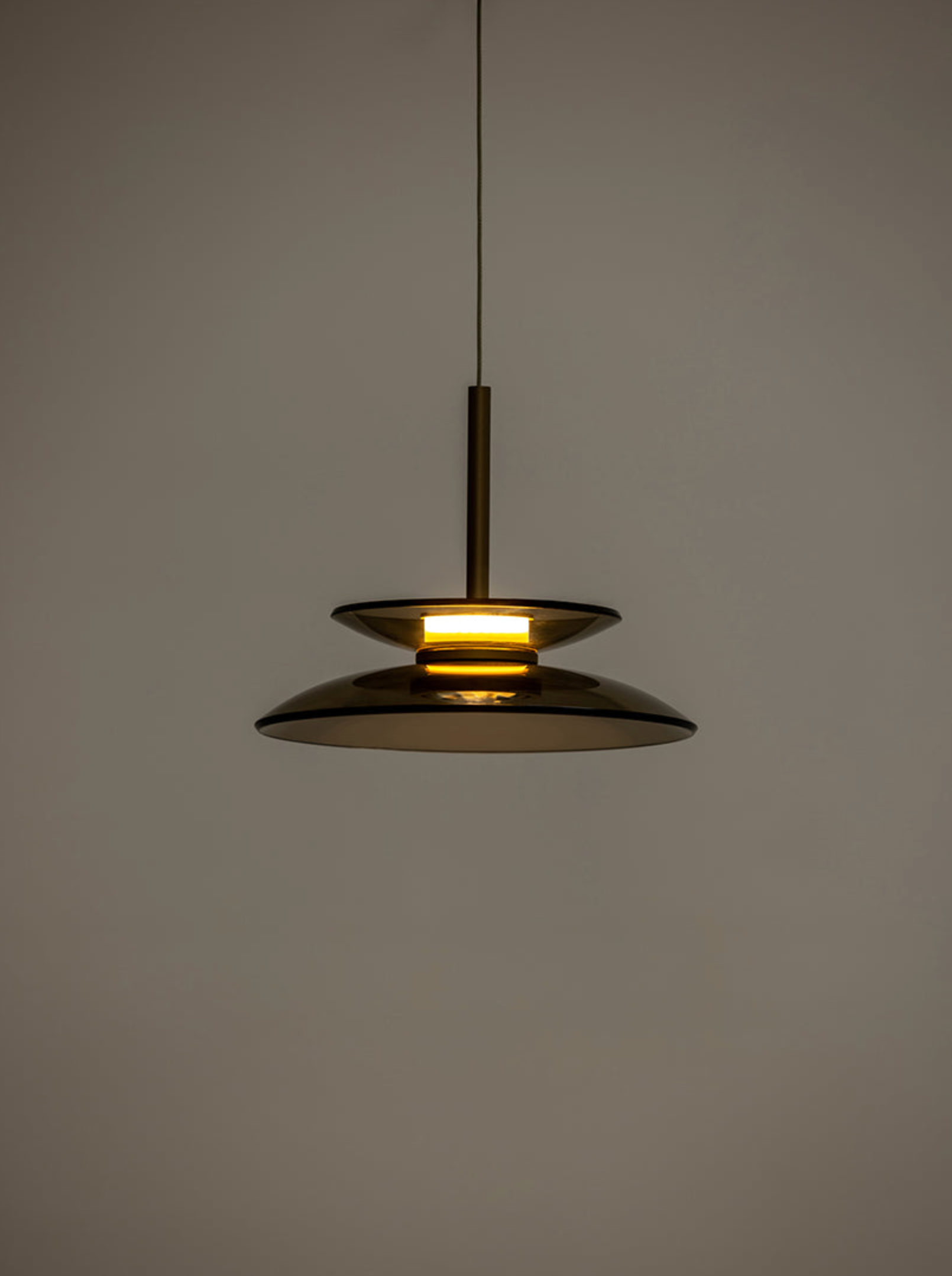 Pendant light fixture on a grey background