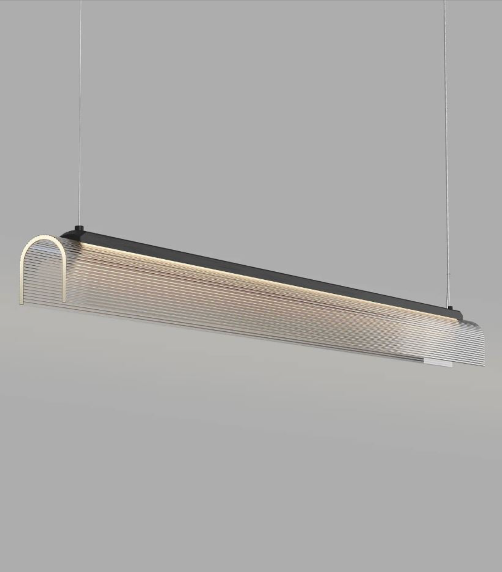 Modern ribbed glass linear pendant light fixture on a grey background