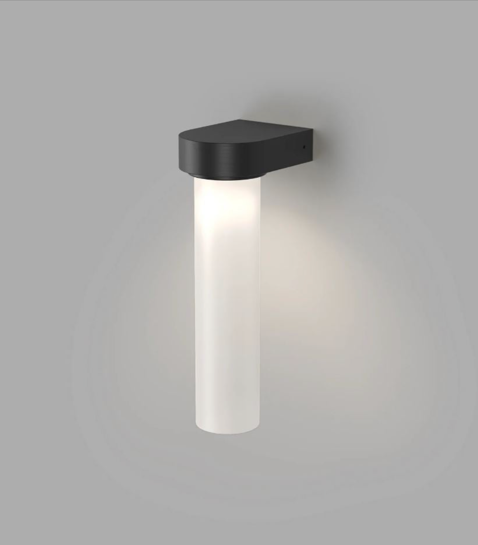 Modern wall-mounted light fixture on a grey background