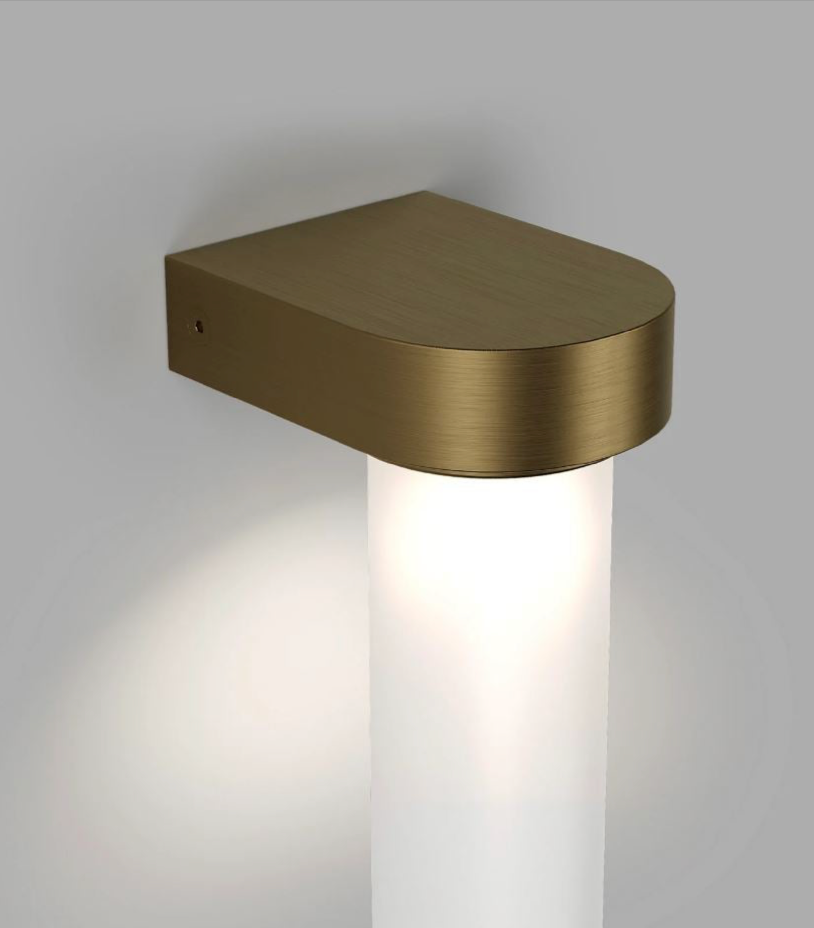 Bronze indoor wall light fixture on a grey background