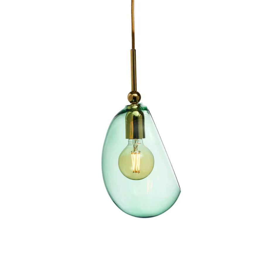 Green glass pendant light with gold fixture on a white background