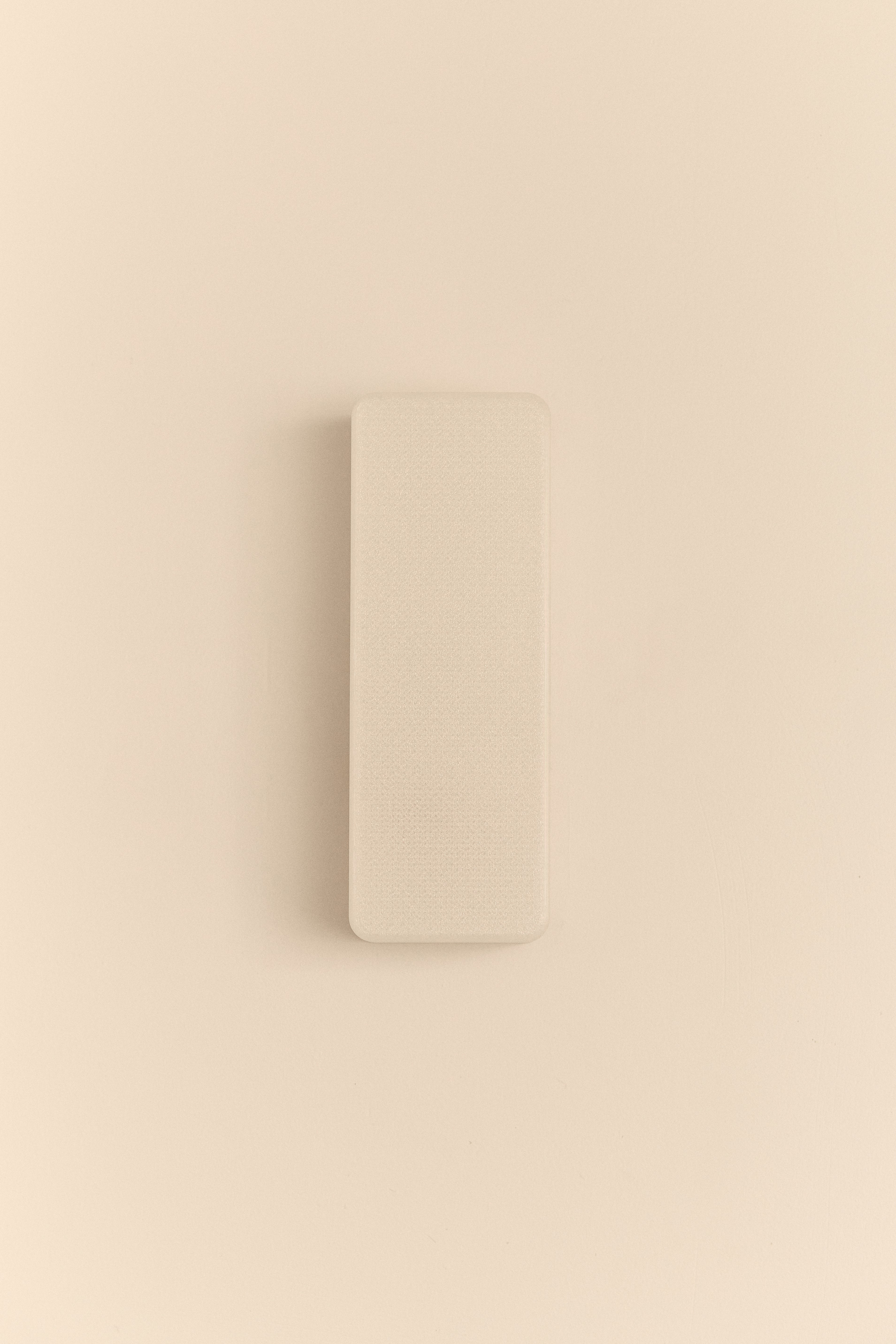 3D printed wall light on a beige background