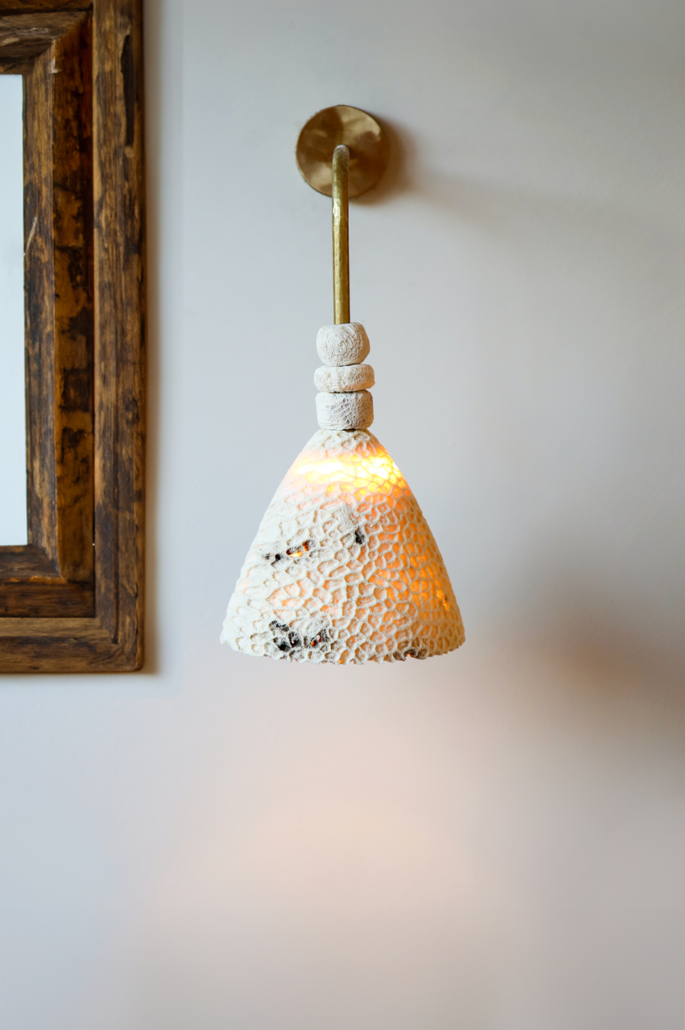 Fossil Coral Arc Cone Wall Light by Marovo Island Traders - arc cone profile view