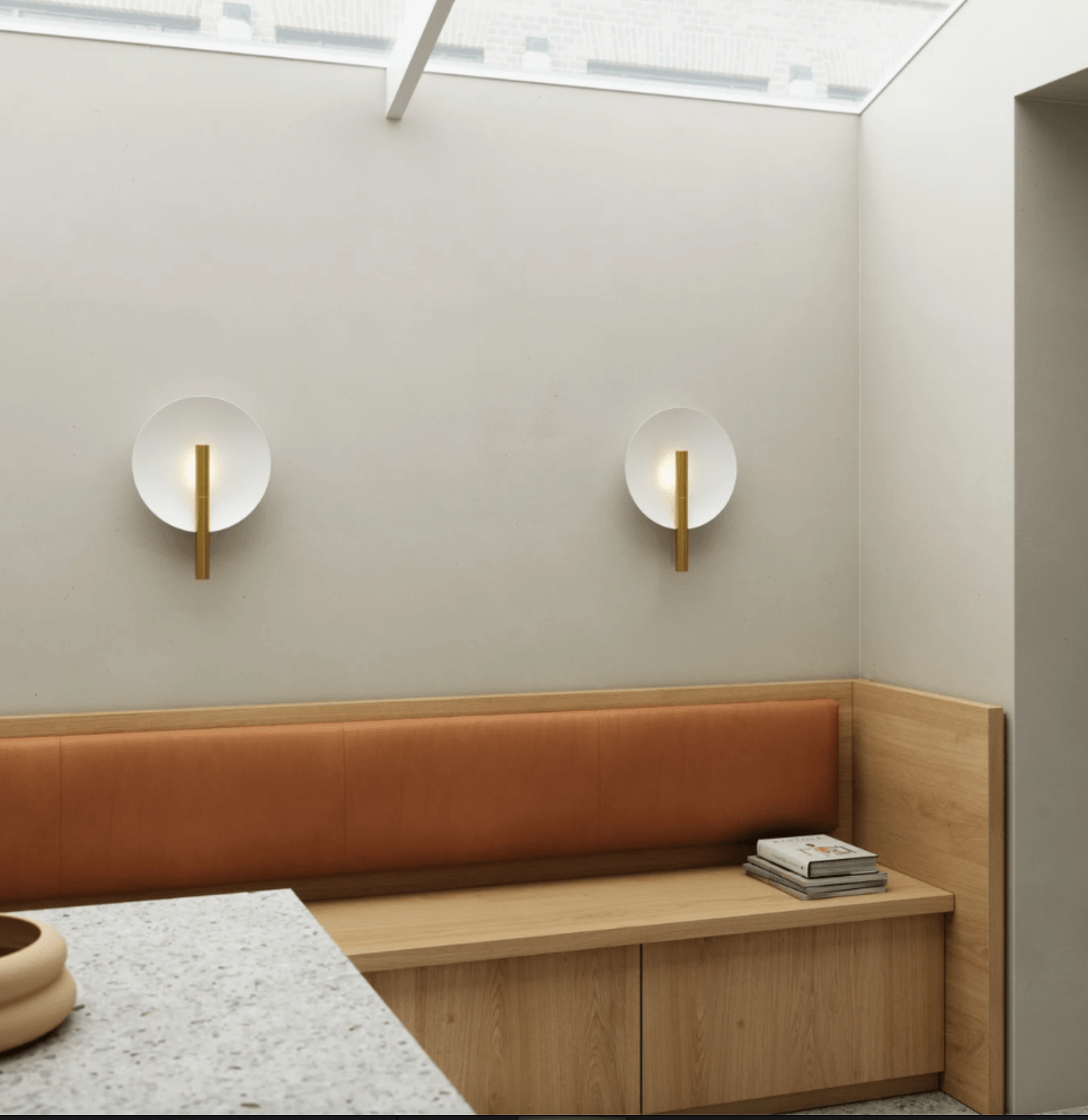 Modern interior with wooden bench and wall lights