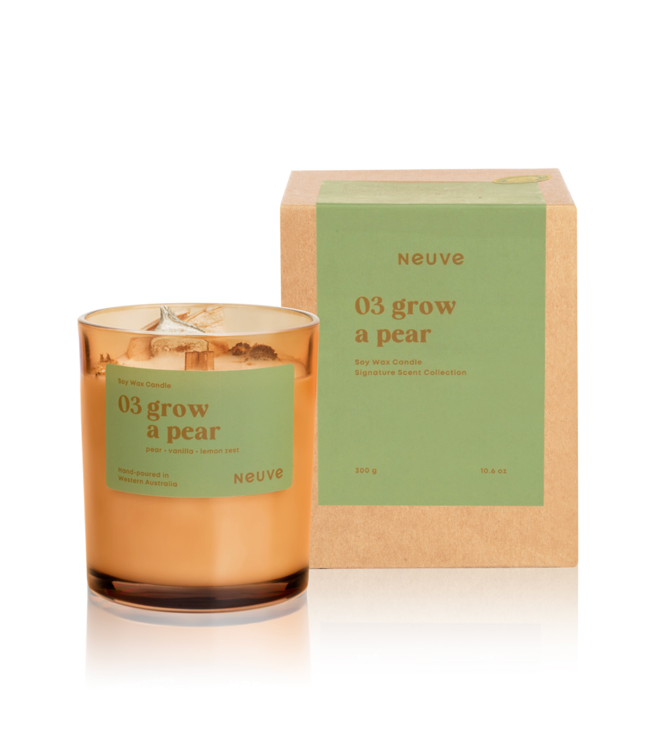 Candle labeled '03 grow a pear' by 'Neuve' with its packaging on a white background