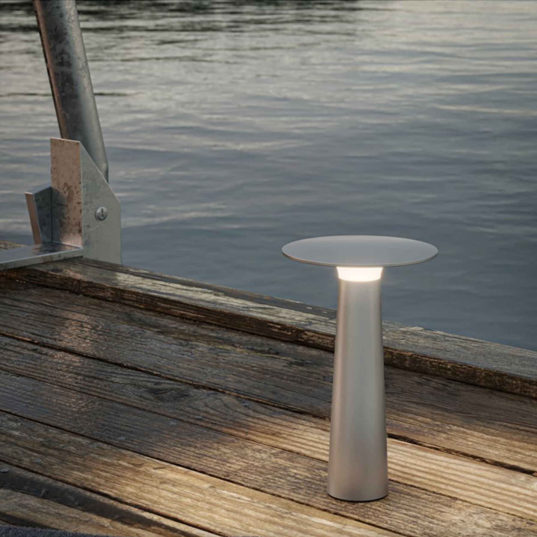 Modern outdoor lamp on a wooden dock by water
