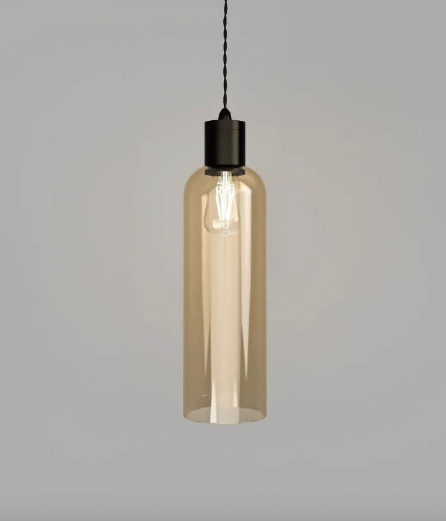 Pendant light with a cylindrical glass shade on a gray background