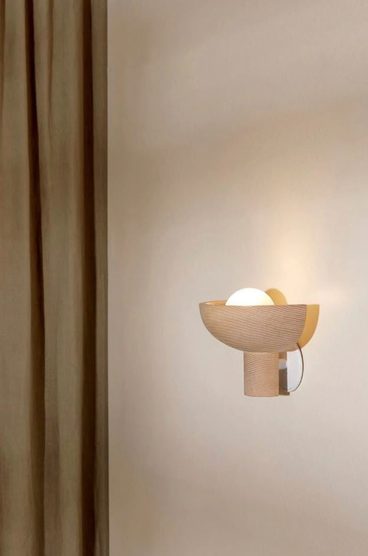 Modern wall lamp with wooden design on a beige wall