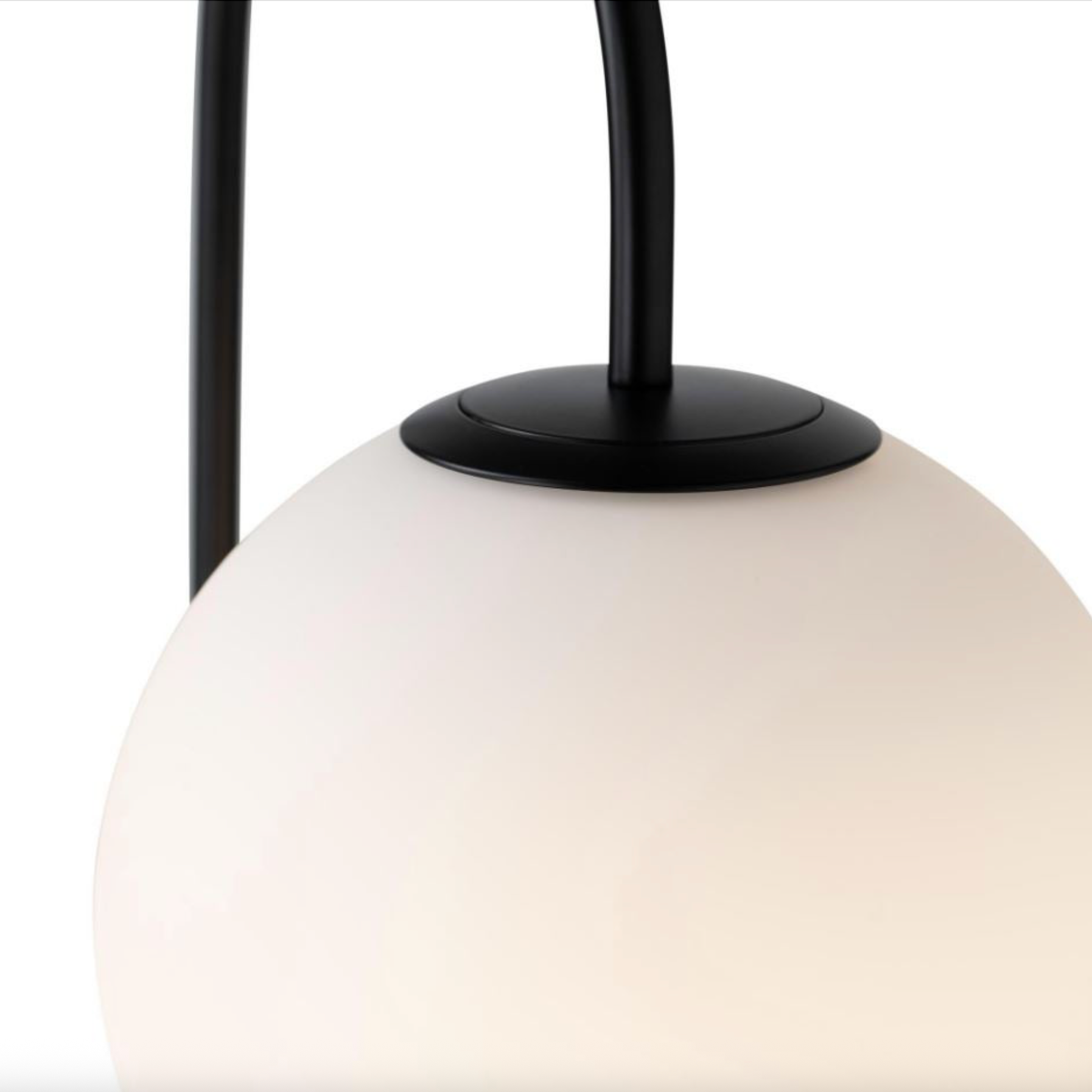 Lamp shade with white glass shade and black metal fixture on a white background