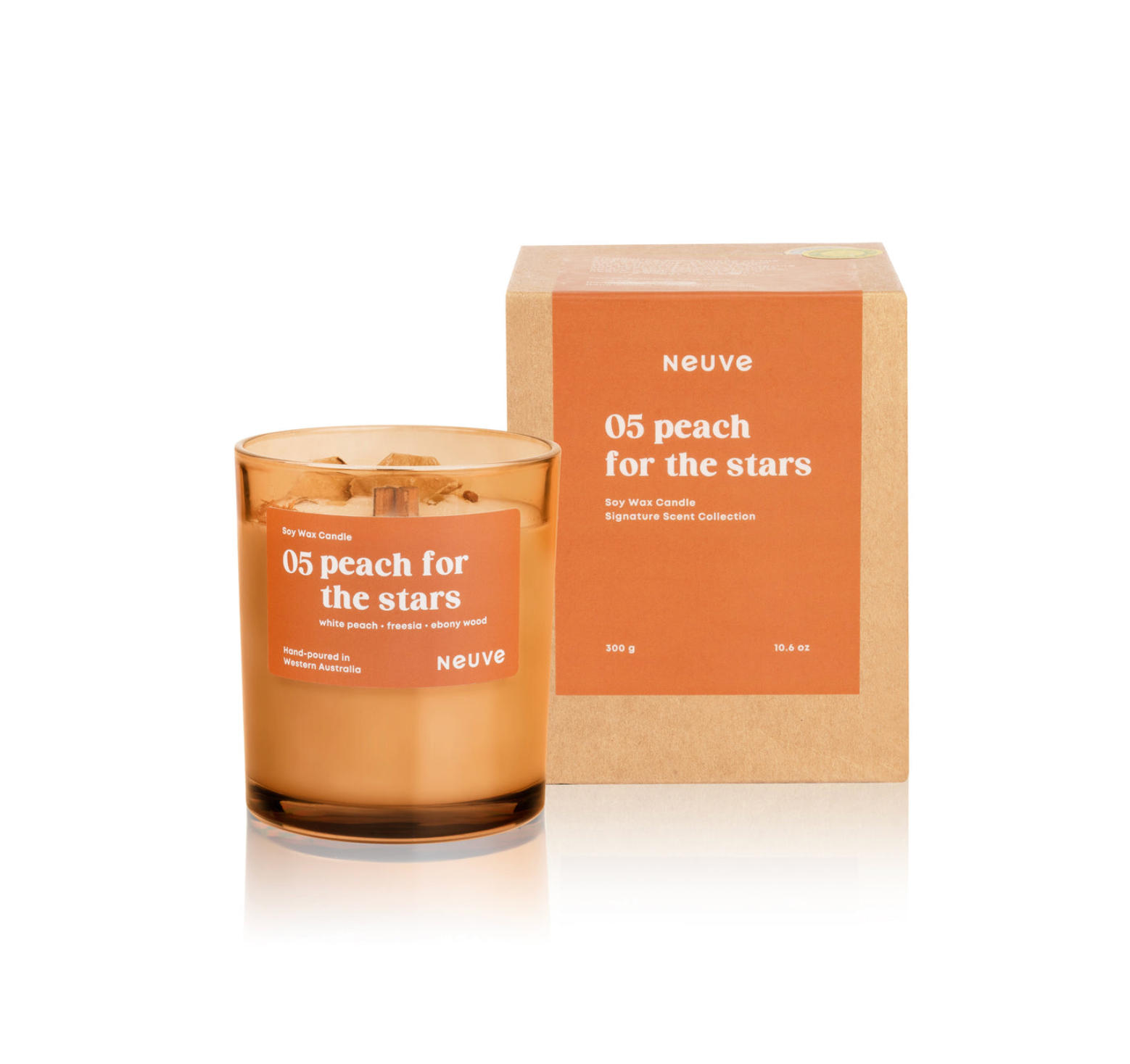 Neuve '05 peach for the stars' candle and packaging on a white background