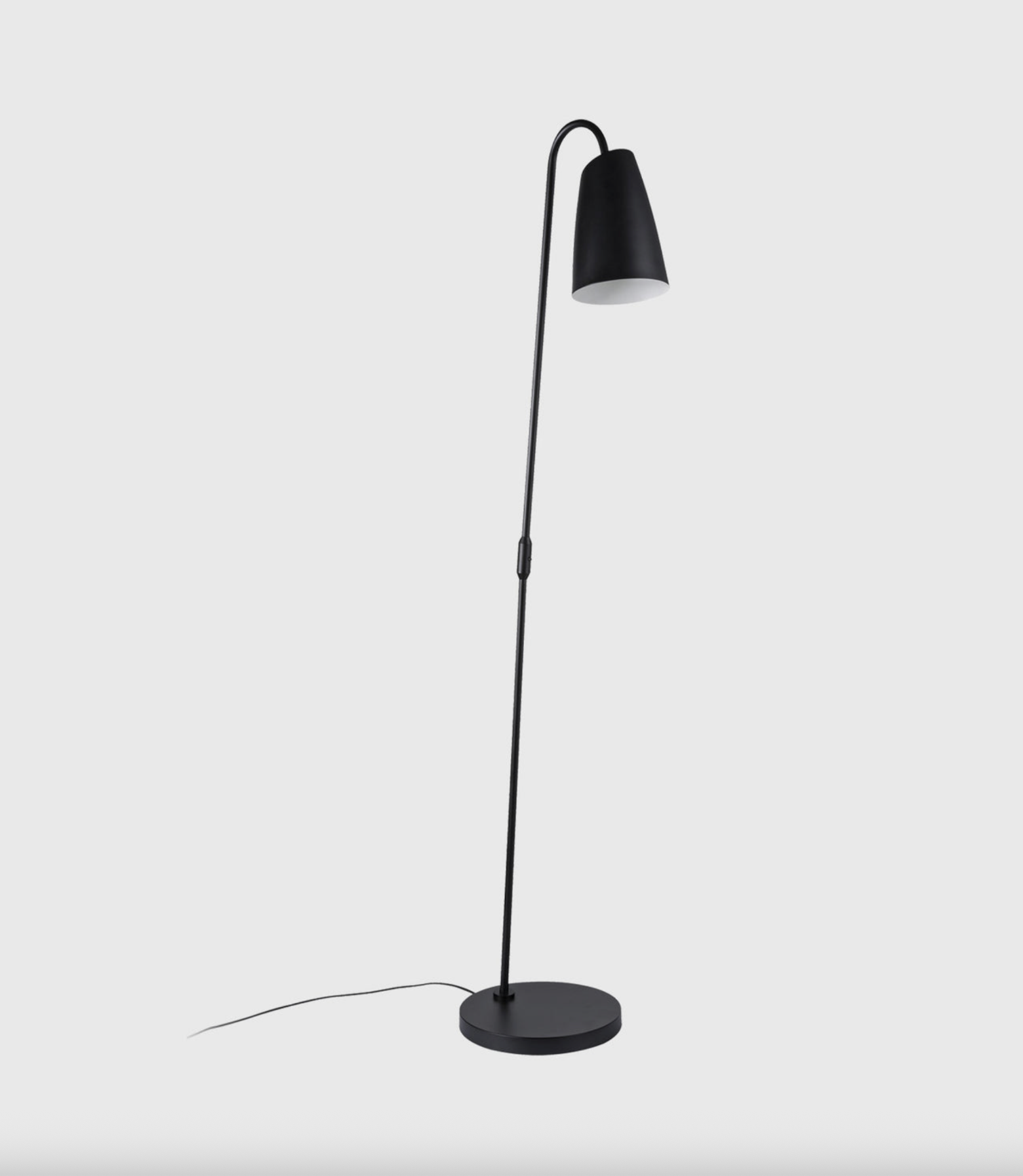 Black floor lamp on a white background