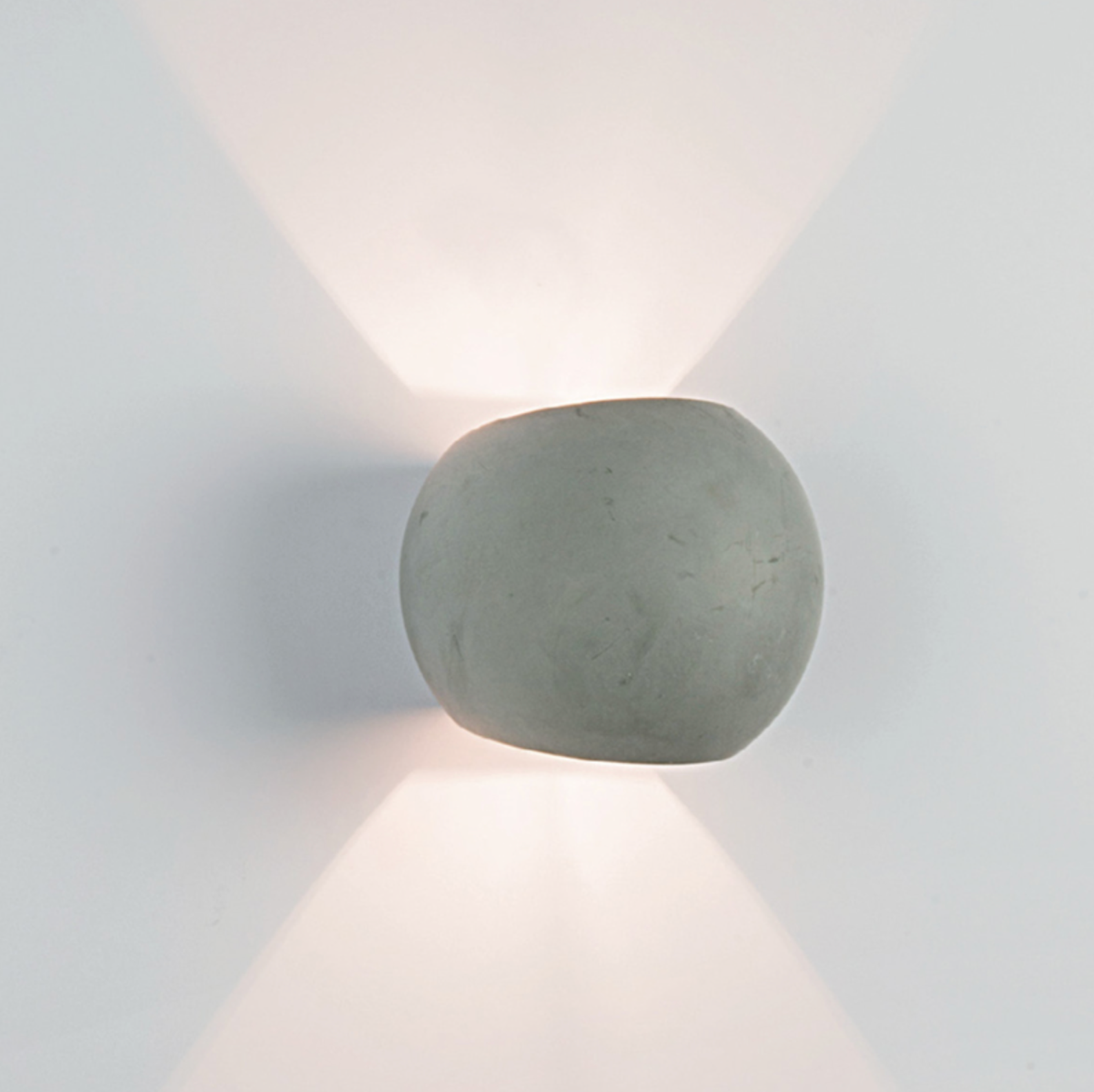 Concrete wall light fixture on a white background
