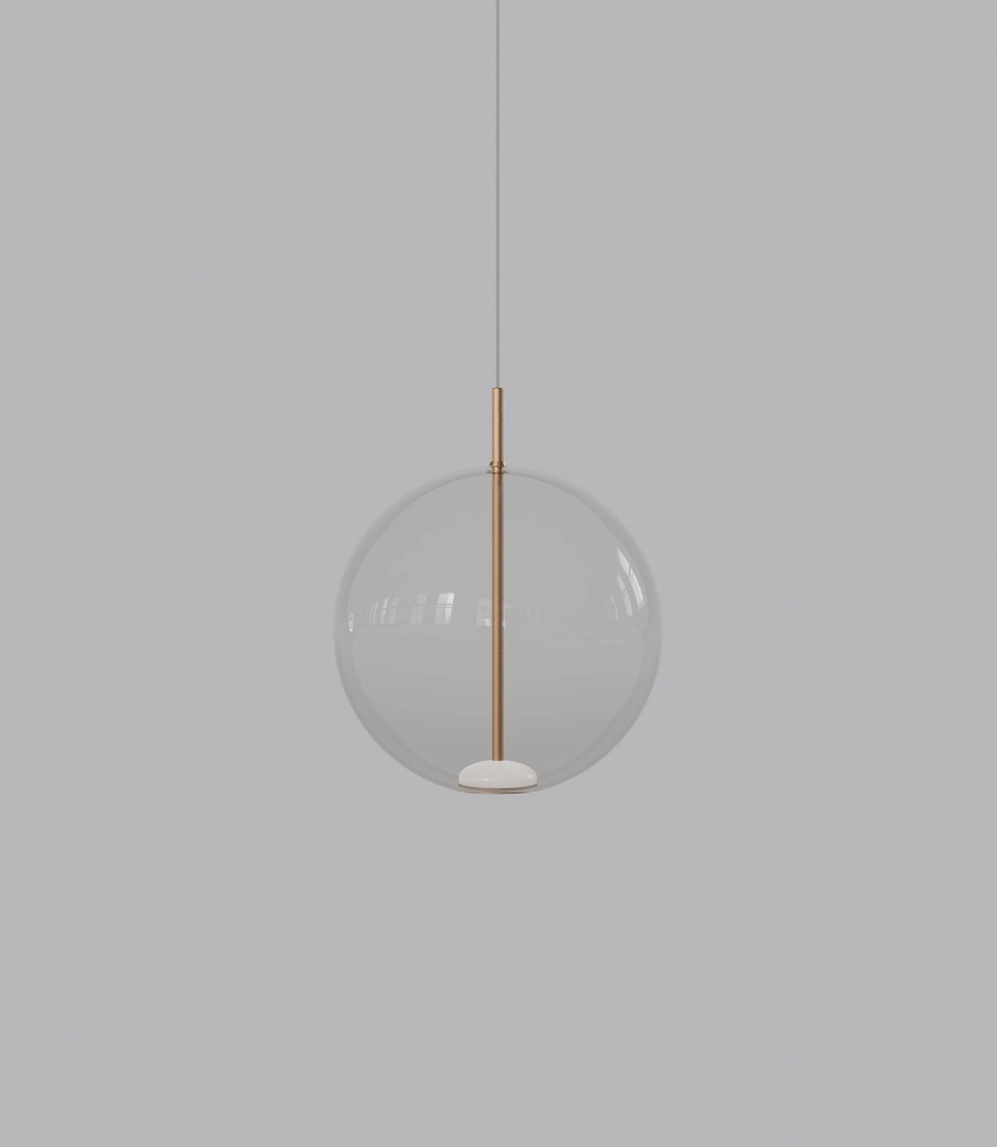 Spherical glass pendant light with a gold accent on a grey background