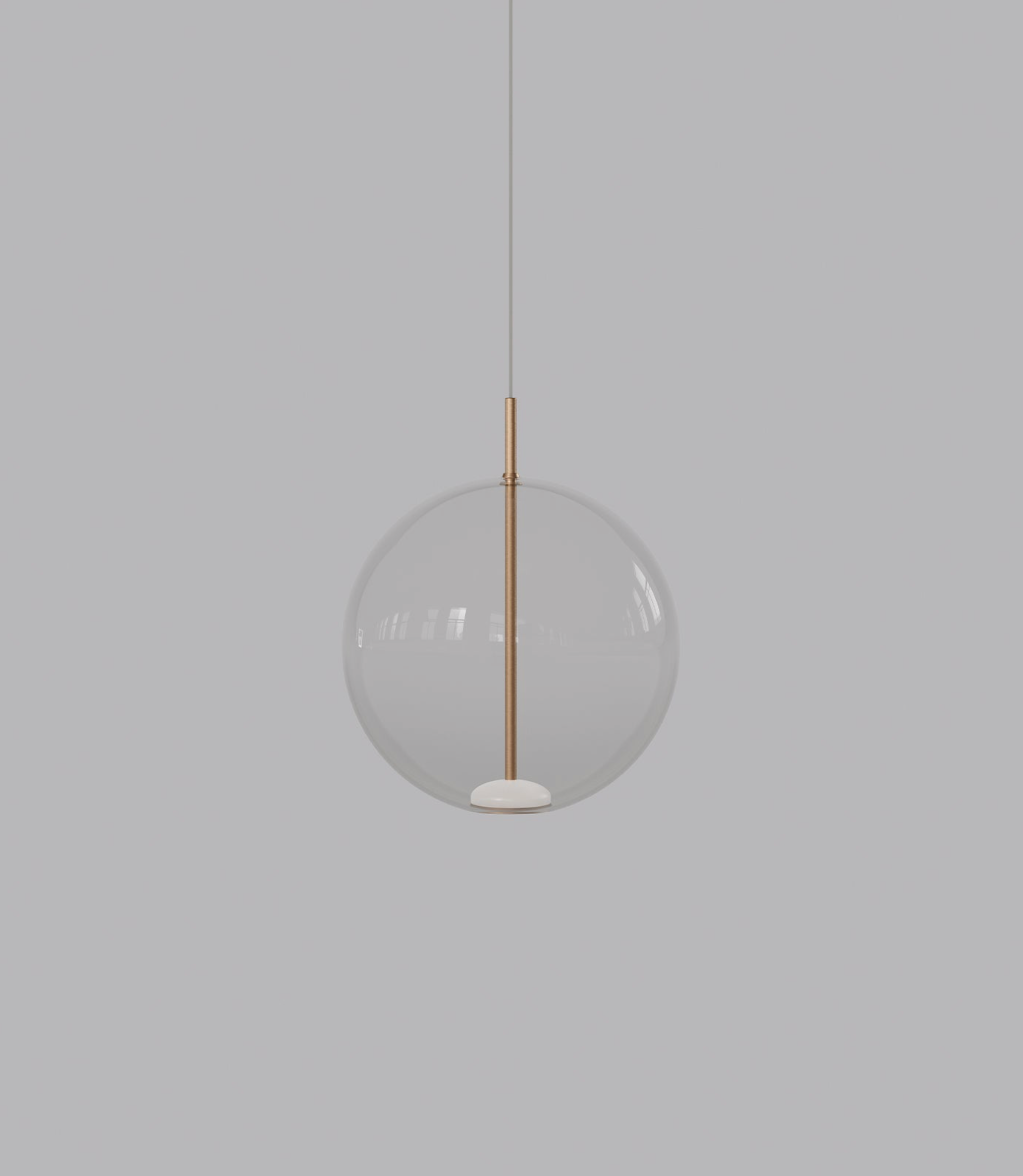Spherical glass pendant light with a gold accent on a grey background