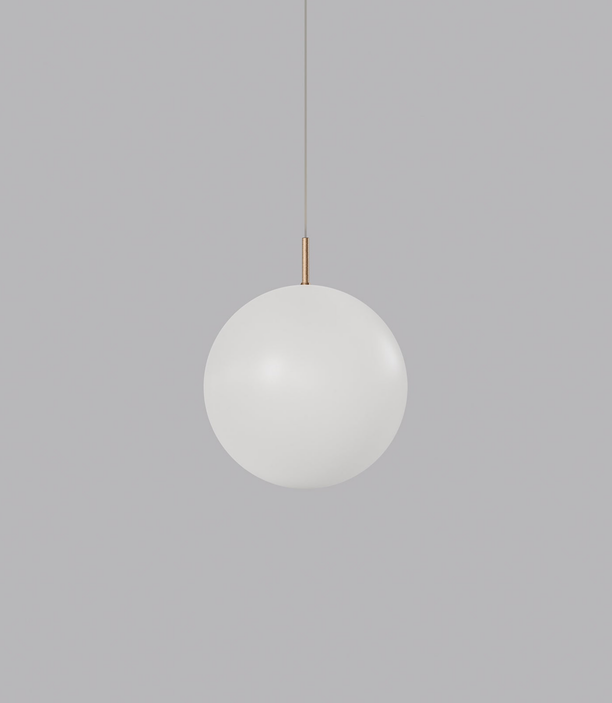 Spherical glass pendant light on a grey background