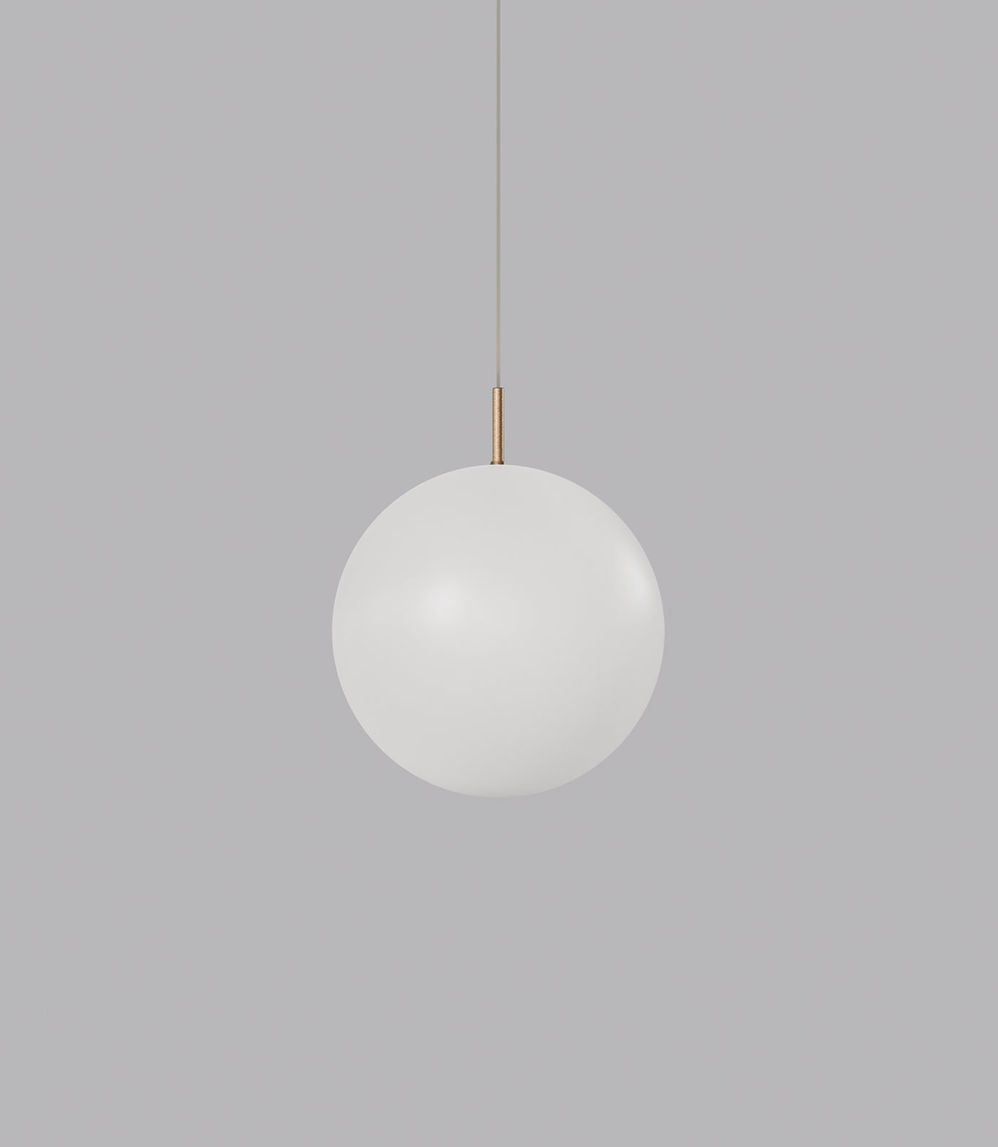 Spherical glass pendant light on a grey background