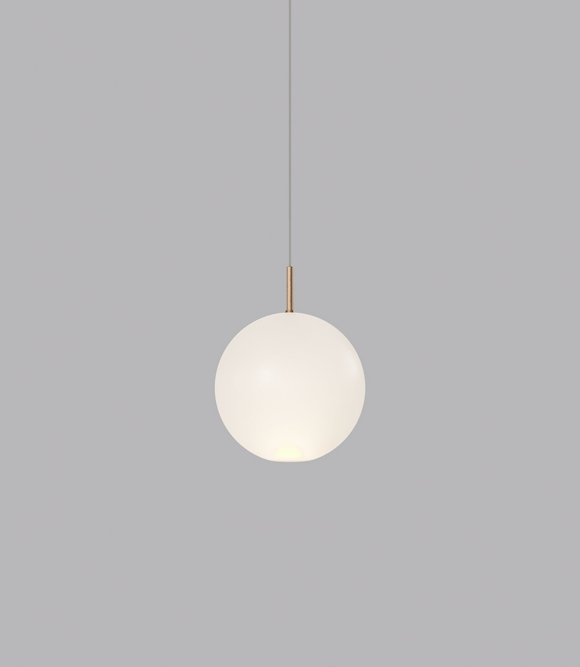 Spherical glass pendant light on a grey background