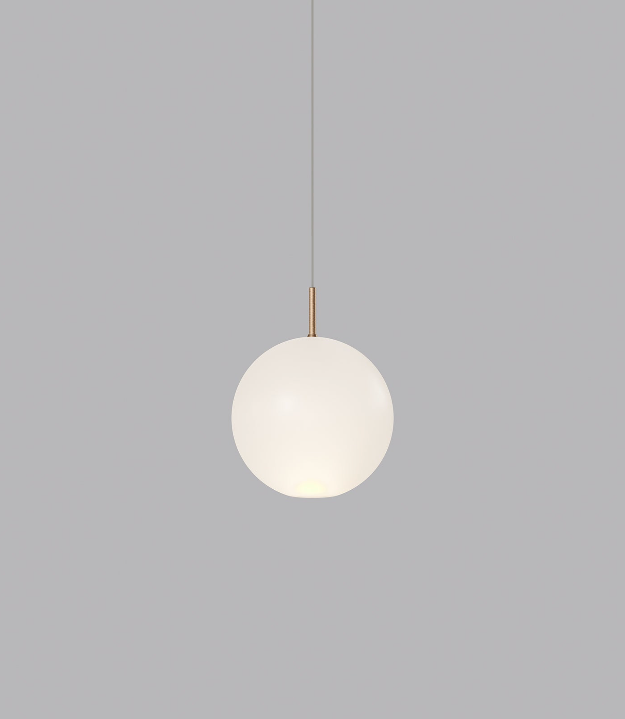 Spherical glass pendant light on a grey background