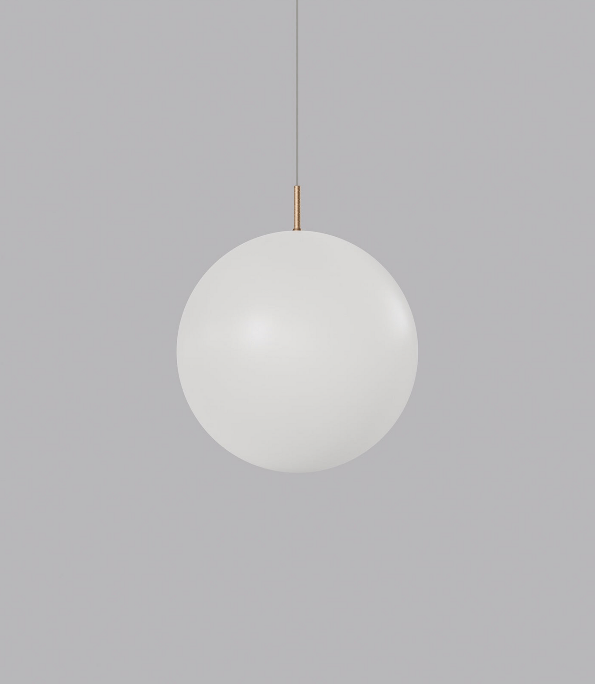 Spherical glass pendant light on a grey background