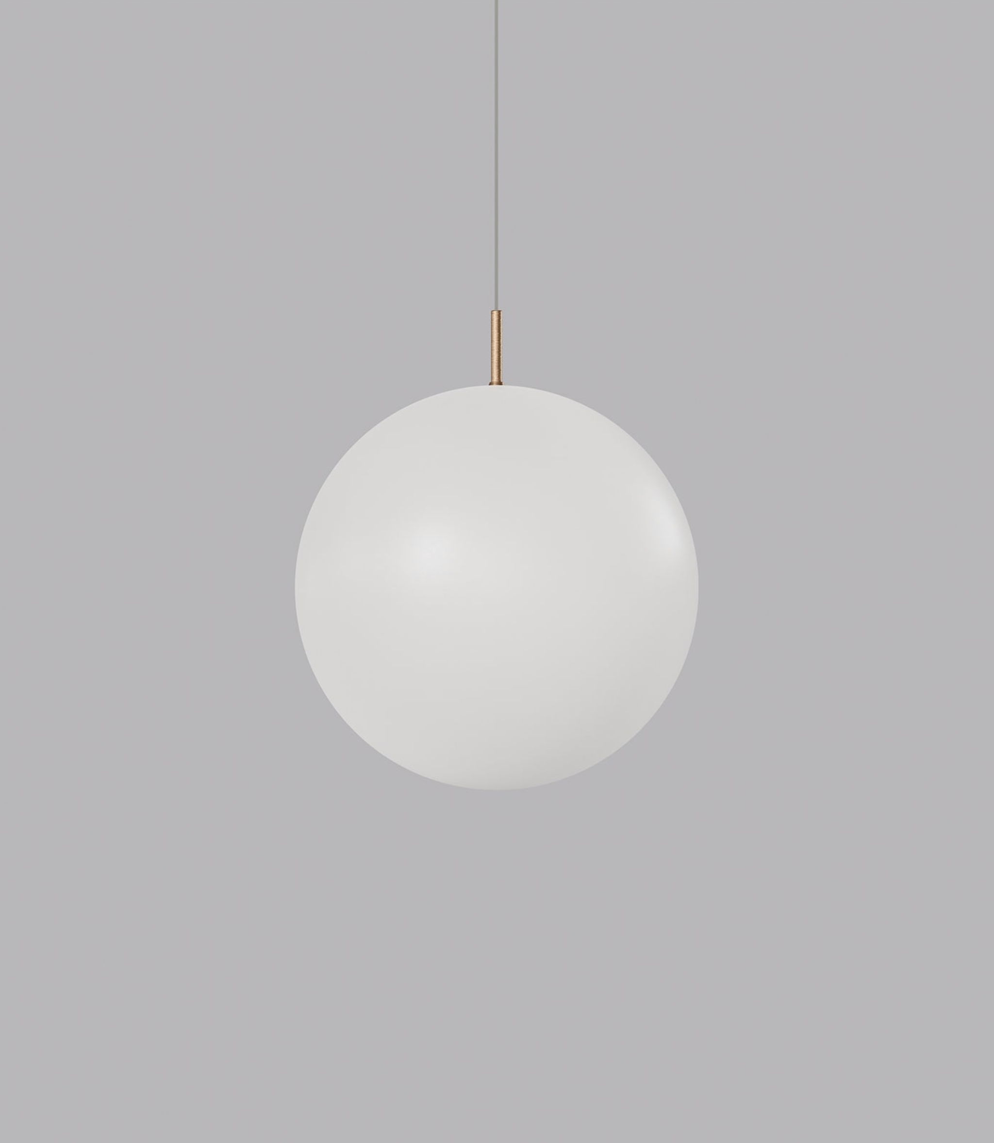 Spherical glass pendant light on a grey background