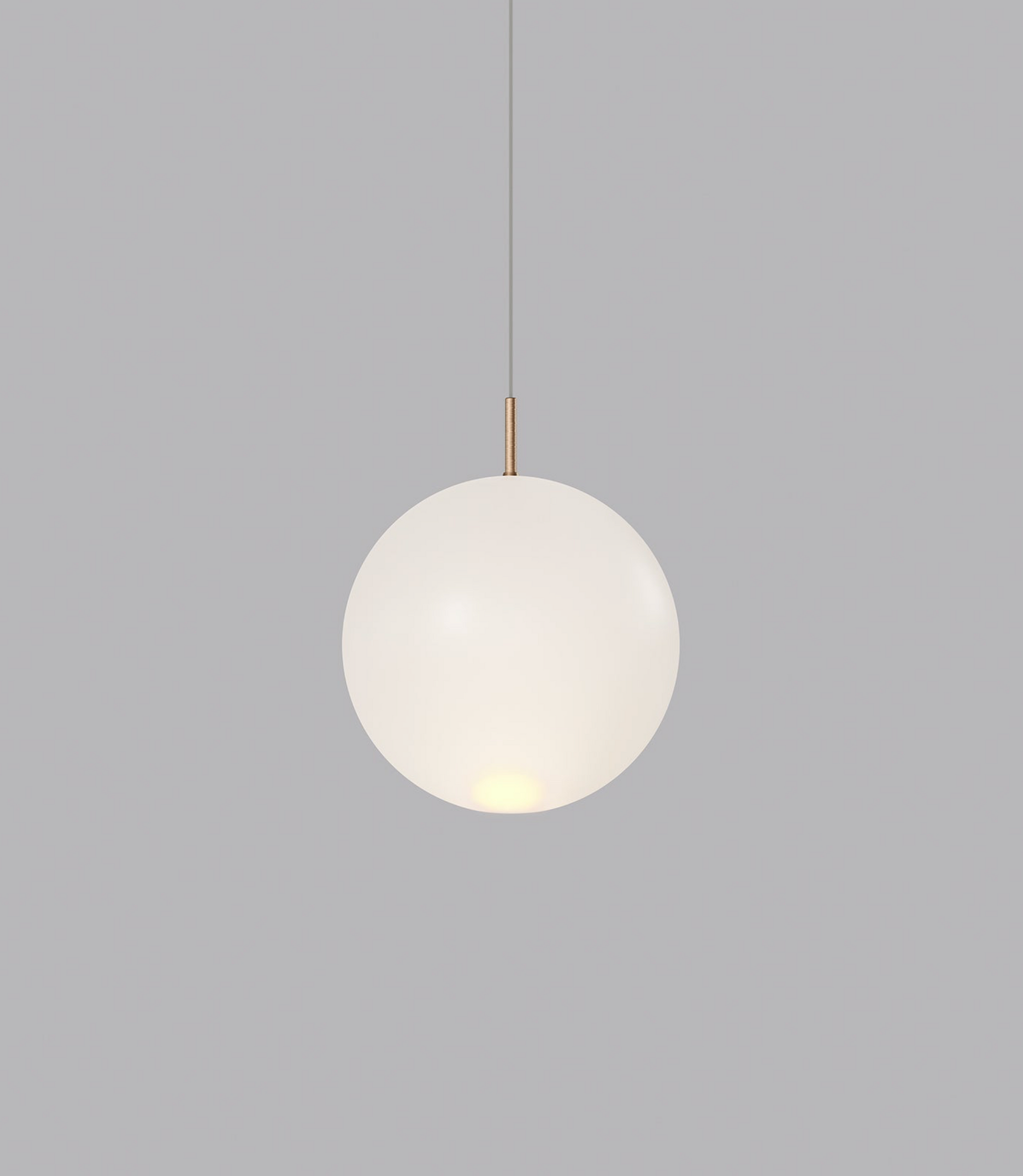 Spherical glass pendant light on a grey background