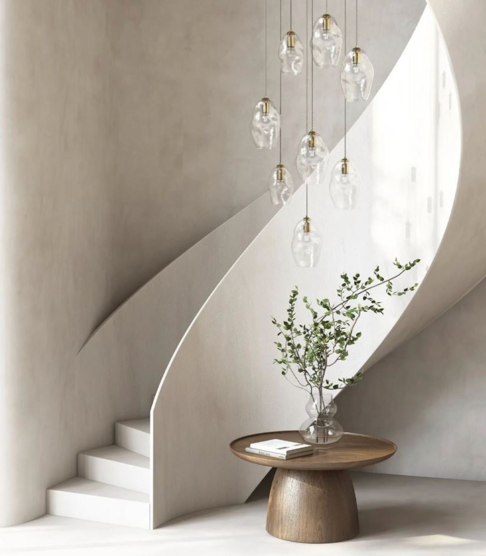 Modern interior with a wooden table, vase with greenery, and hanging glass organic pendant lights.