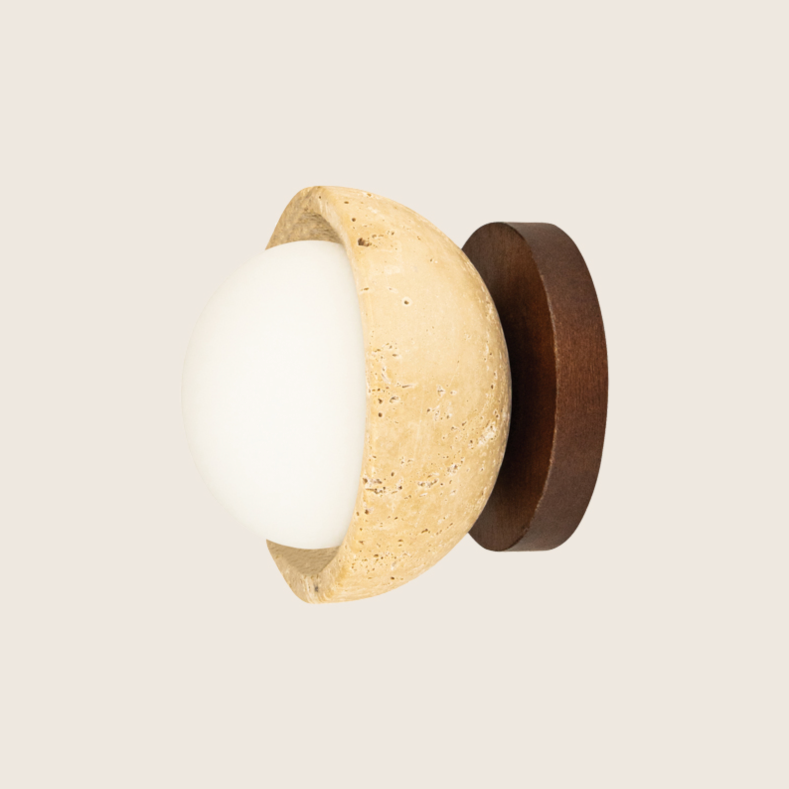 Decorative wall sconce with beige travertine stone-like finish and brown metal accents on a light grey background