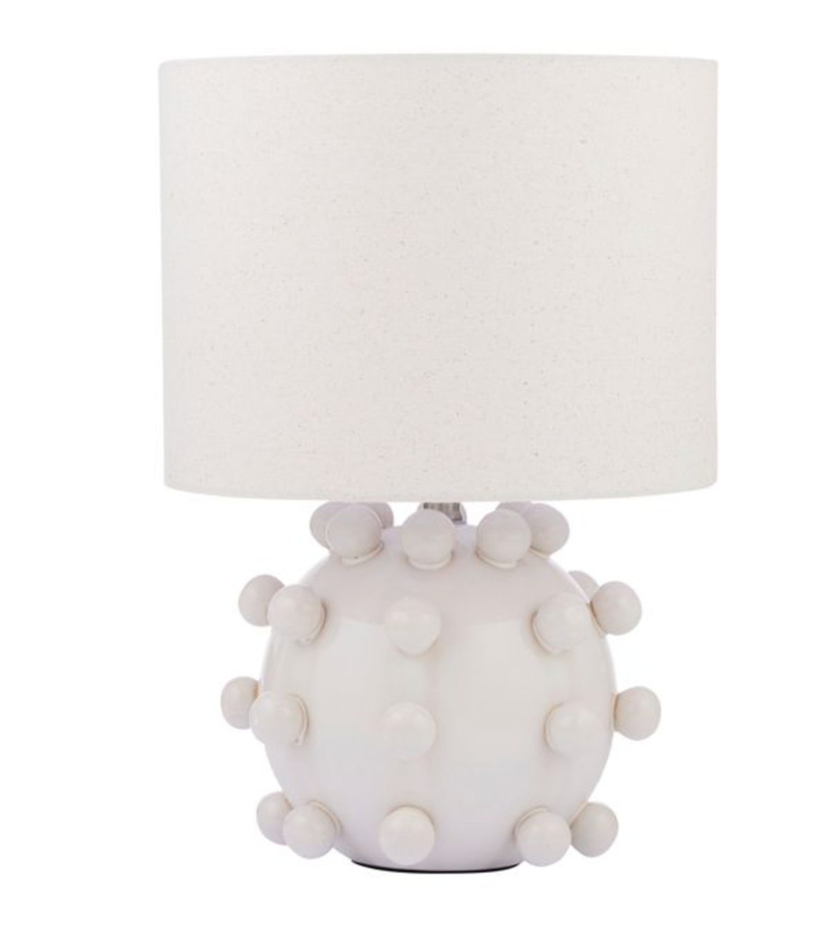 White table lamp with a textured base on a white background