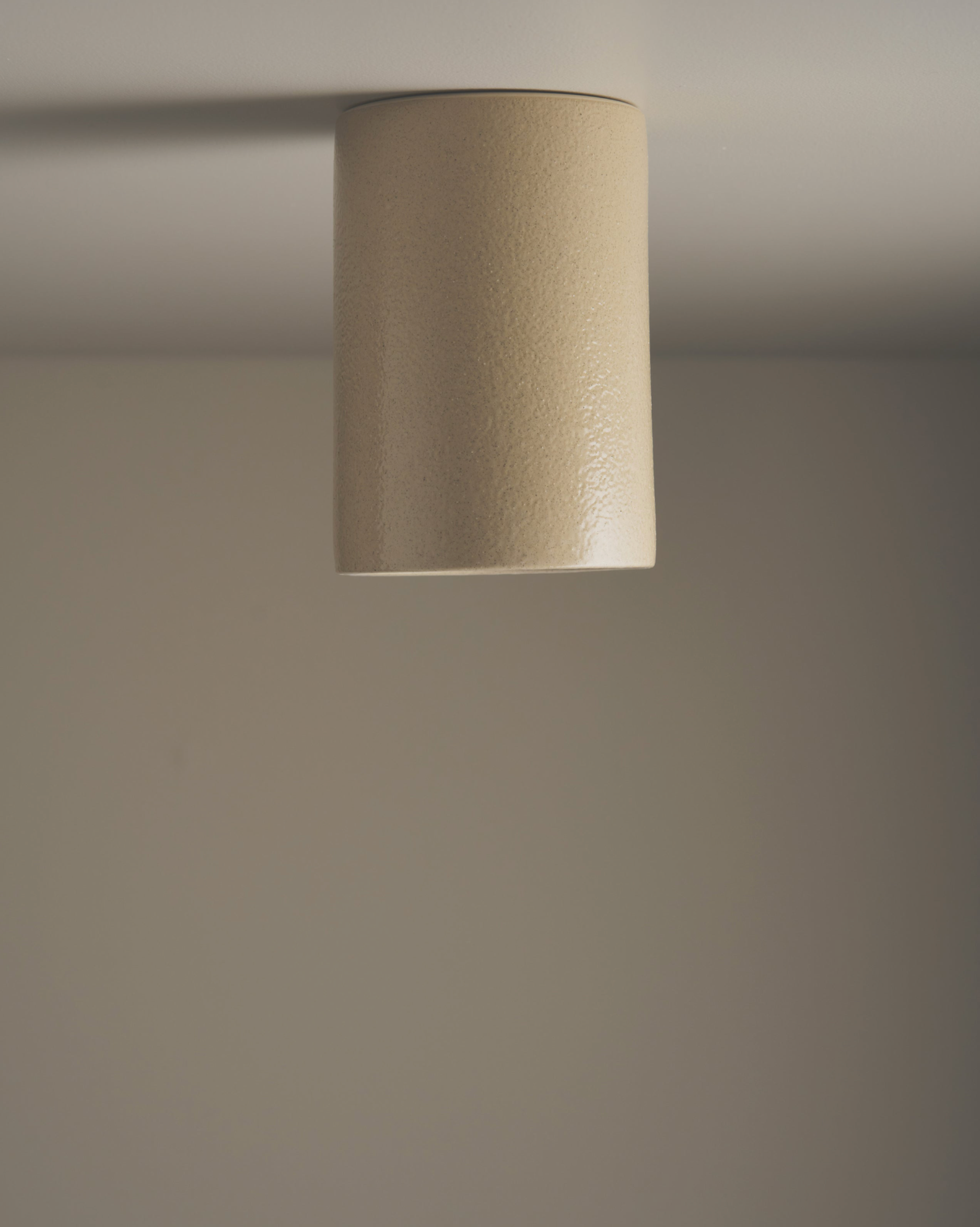 Ceiling light fixture on a plain wall