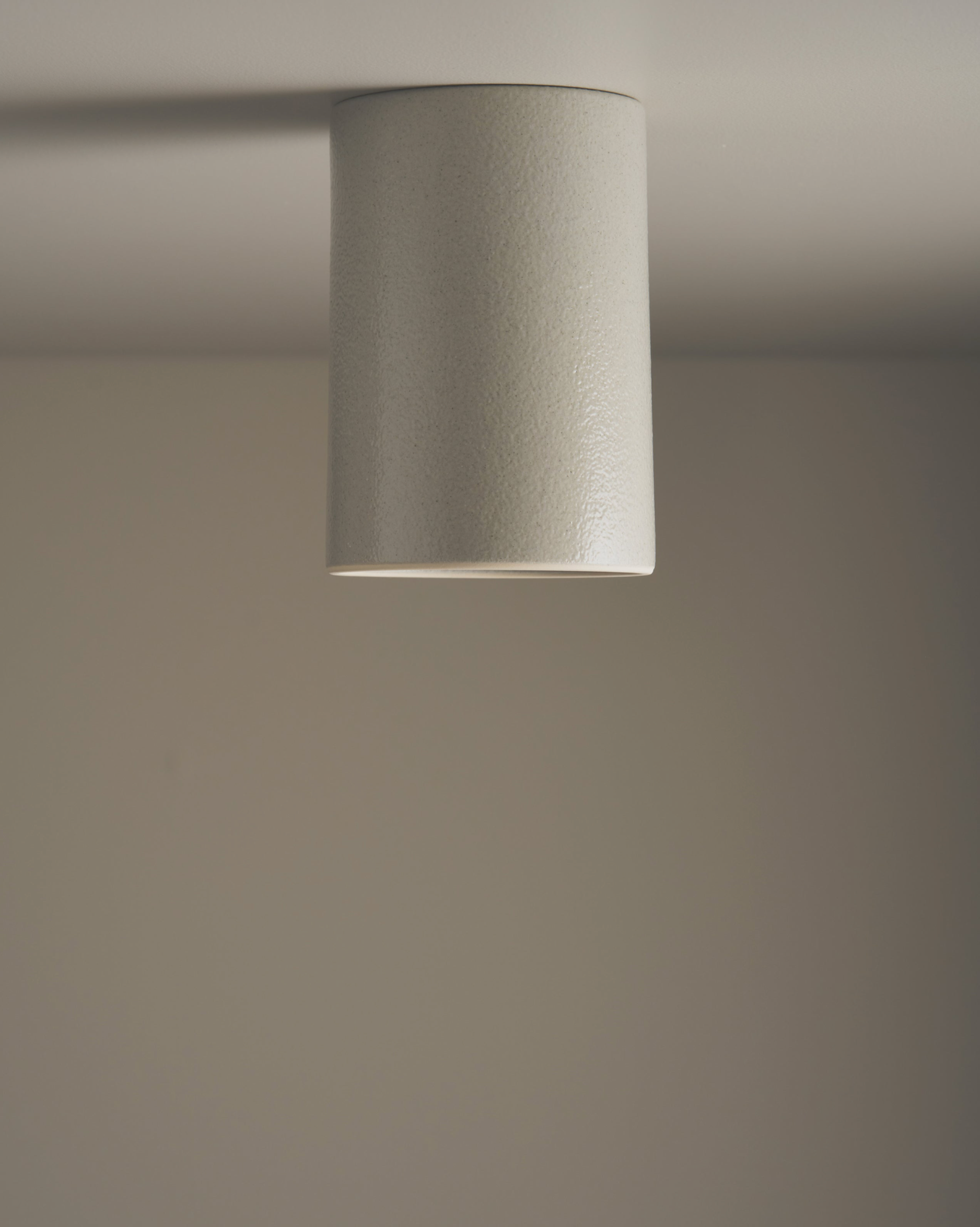Ceiling light fixture on a neutral background