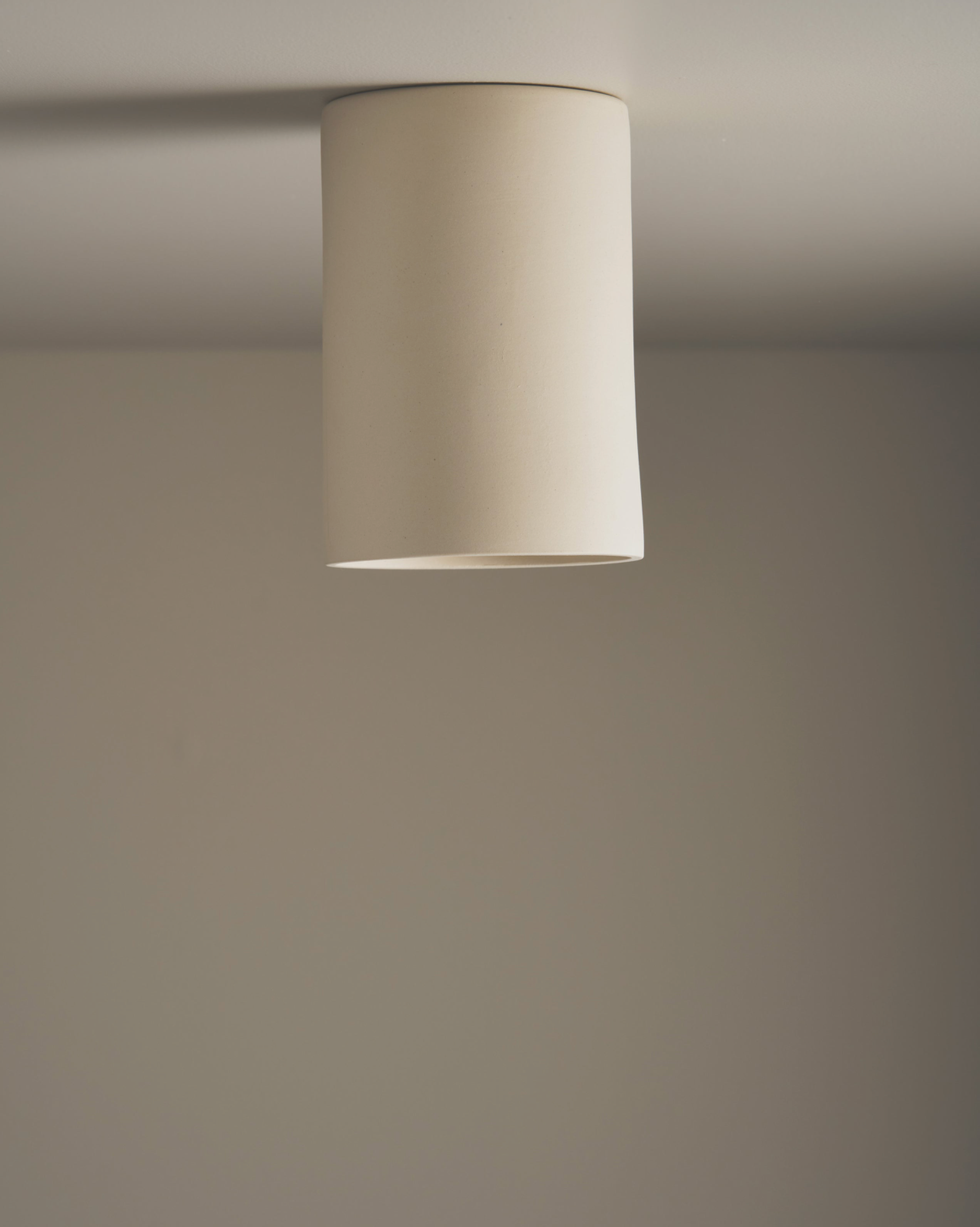 Ceiling light fixture on a plain wall