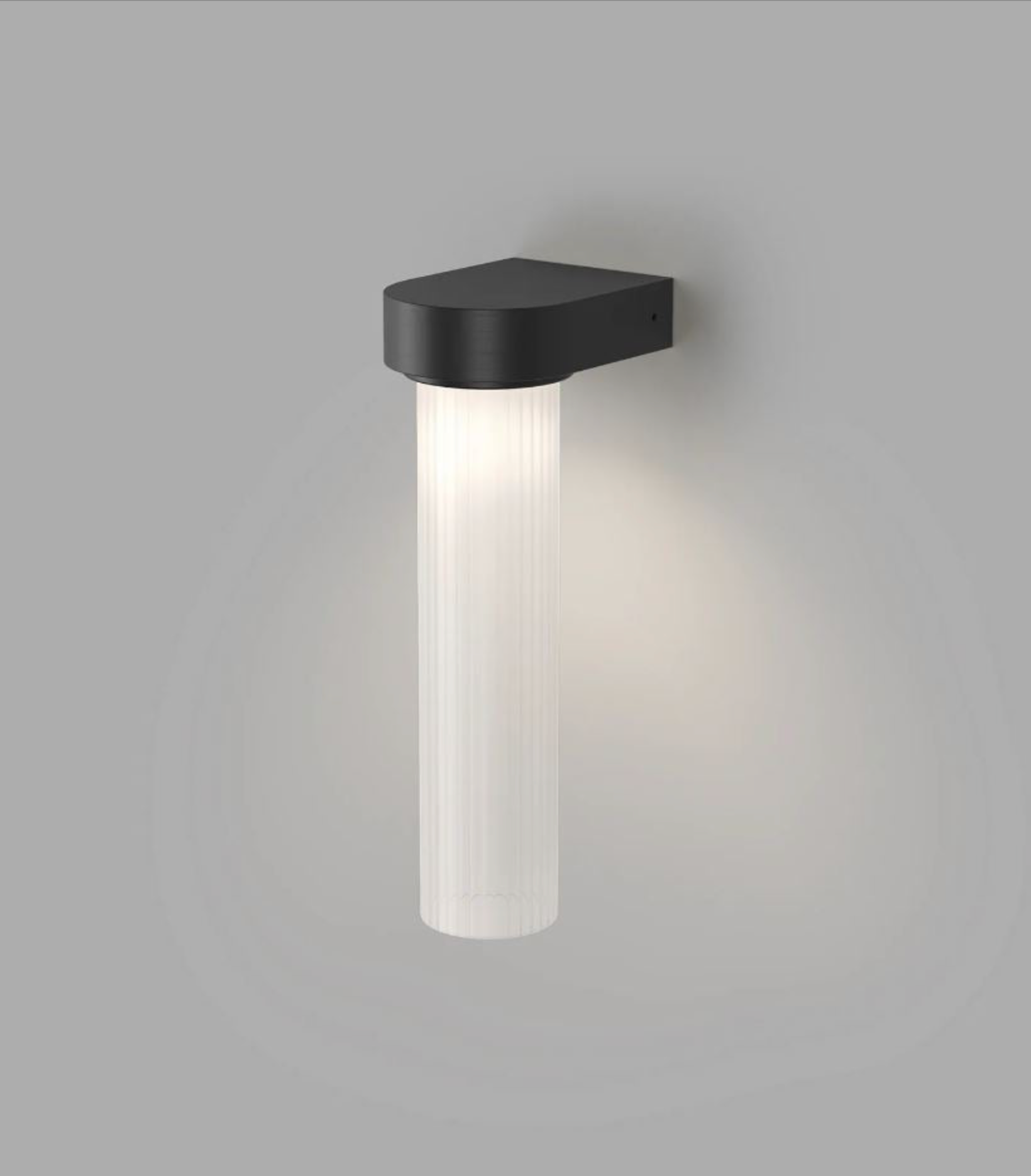 Modern indoor wall light fixture on a grey background
